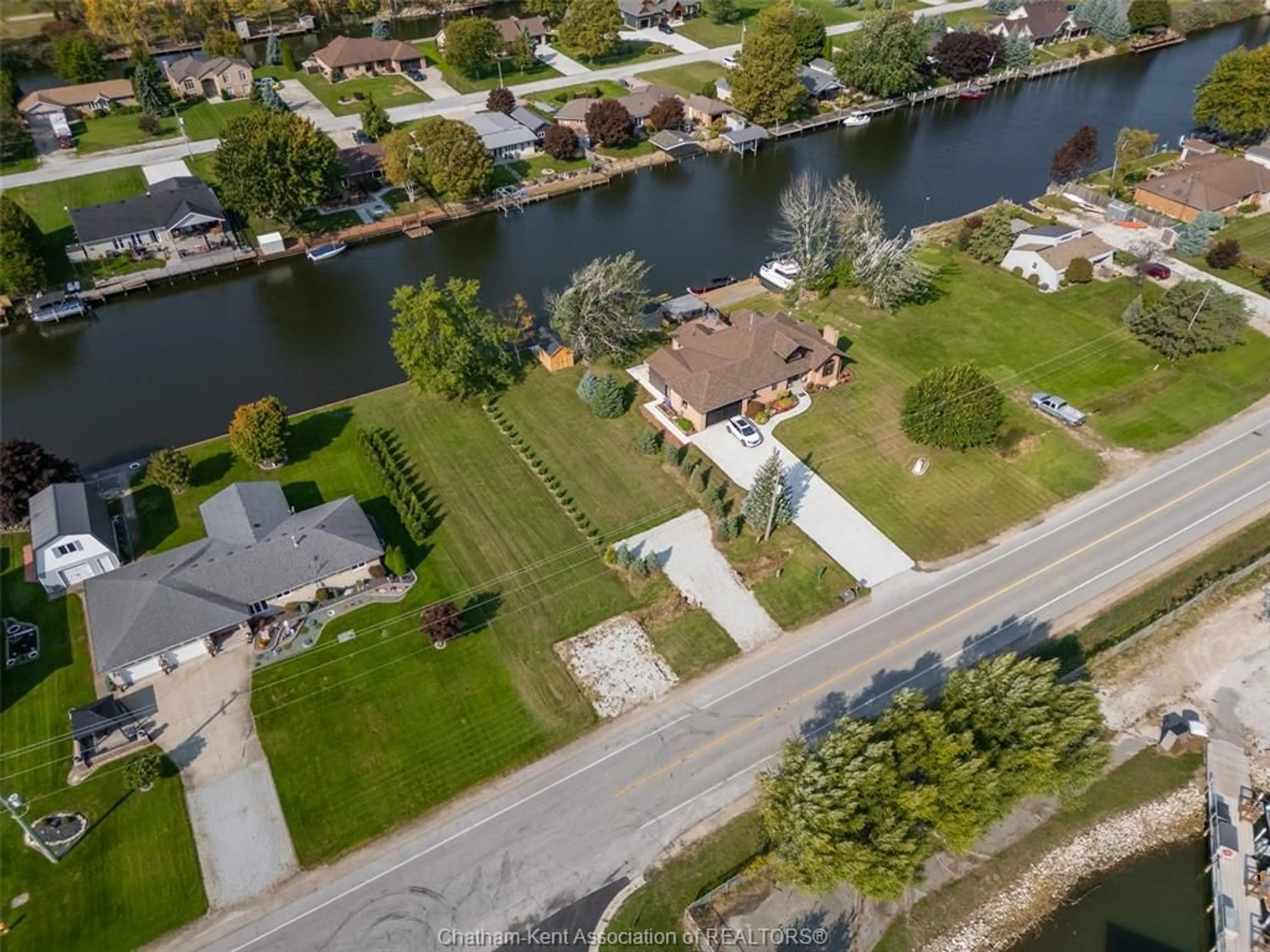 A pic from outside/outdoor area/front of a property/back of a property/a pic from drone, water/lake/river/ocean view for 705 Tisdelle Dr, Lakeshore Ontario N0P 2L0