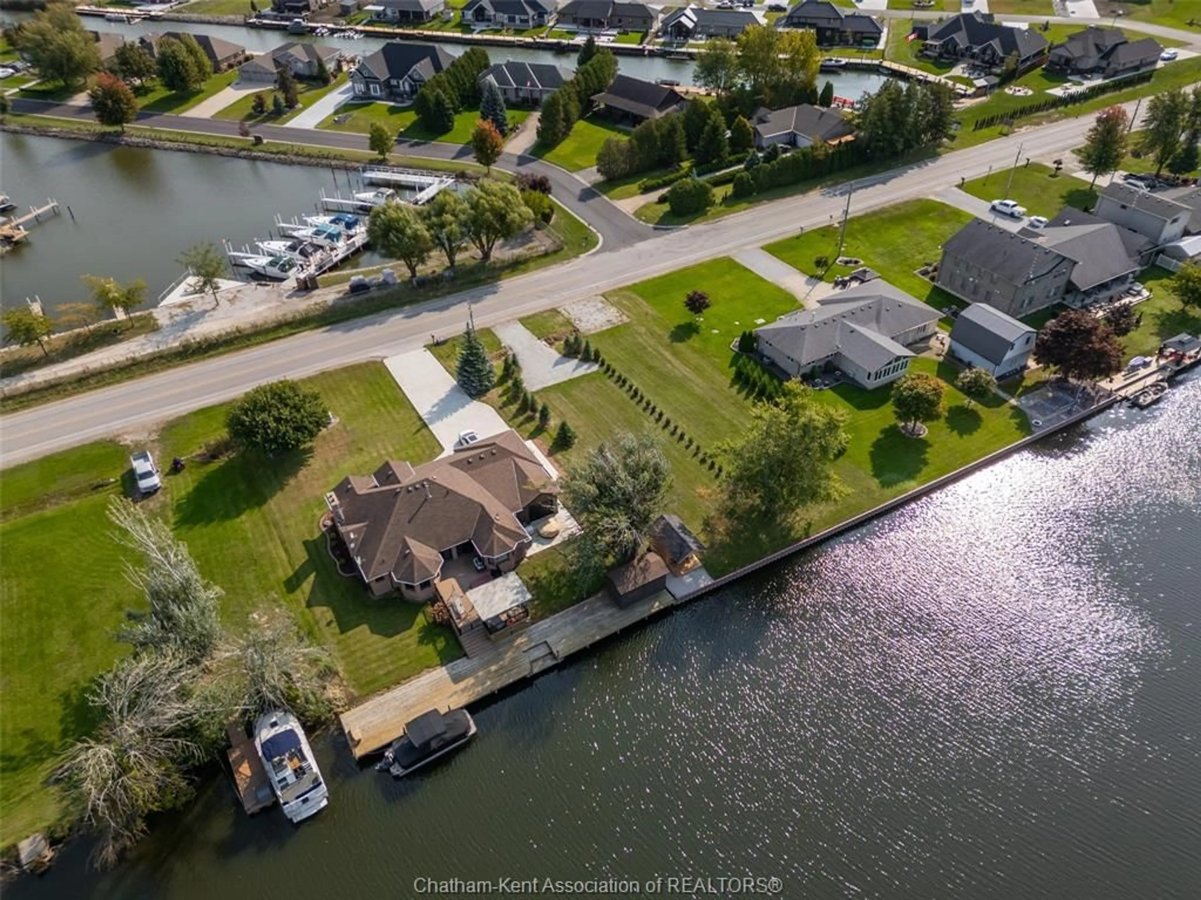 A pic from outside/outdoor area/front of a property/back of a property/a pic from drone, water/lake/river/ocean view for 705 Tisdelle Dr, Lakeshore Ontario N0P 2L0
