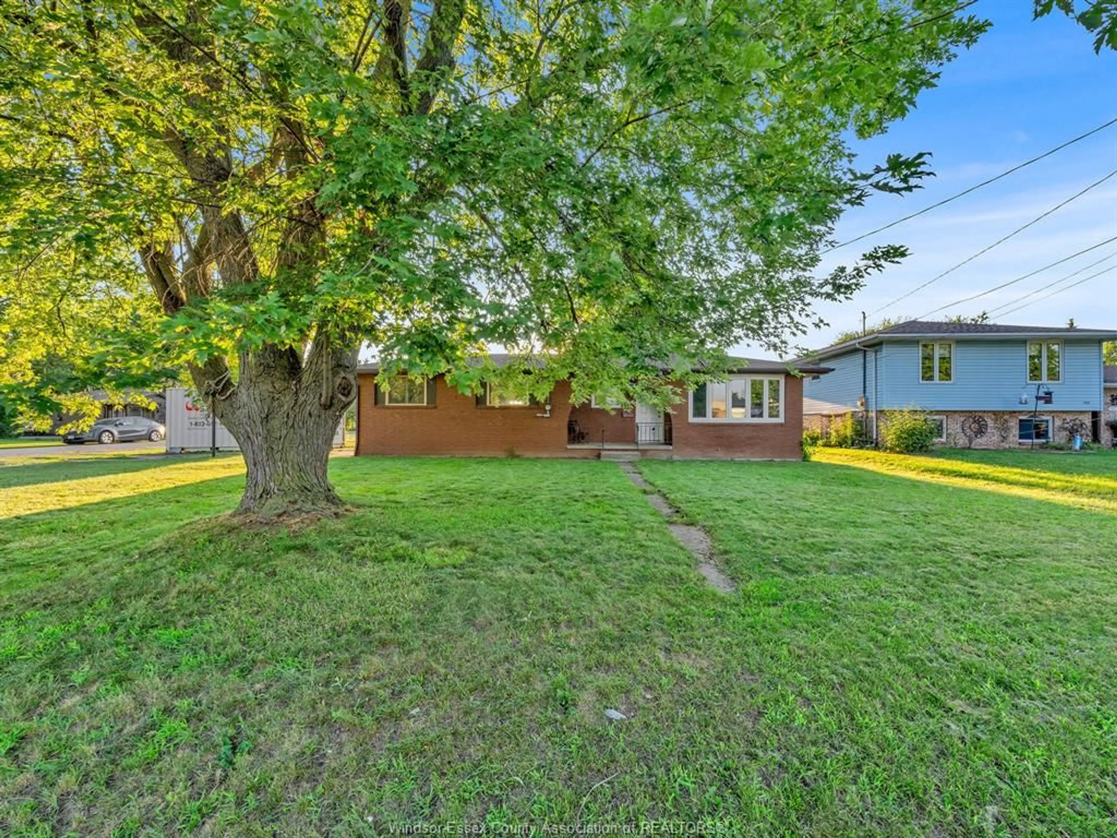 A pic from outside/outdoor area/front of a property/back of a property/a pic from drone, street for 1670 MICHIGAN Ave, LaSalle Ontario N9J 2L6