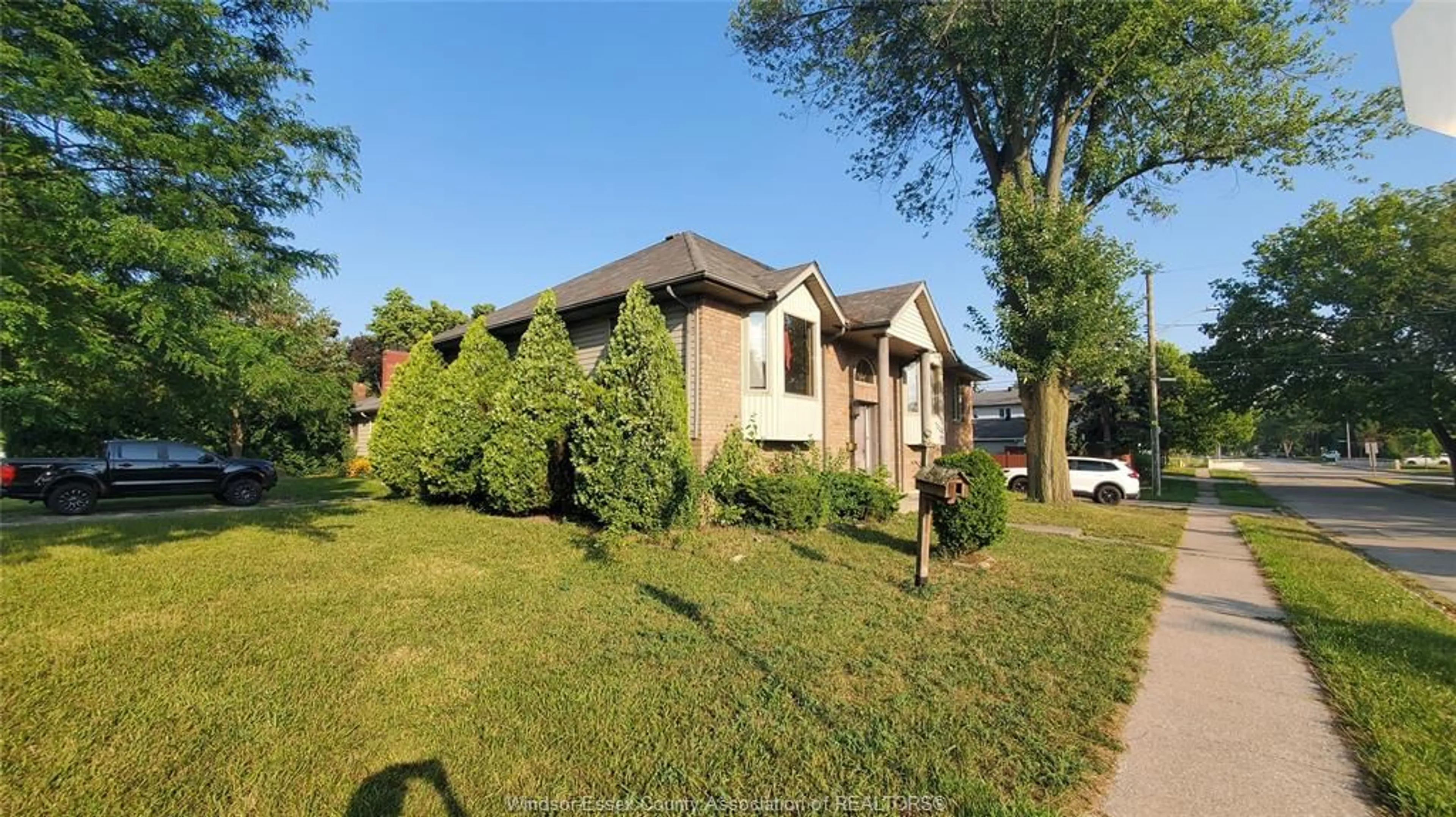 Home with brick exterior material, street for 1995 GRAND MARAIS Rd, Windsor Ontario N9E 1E9