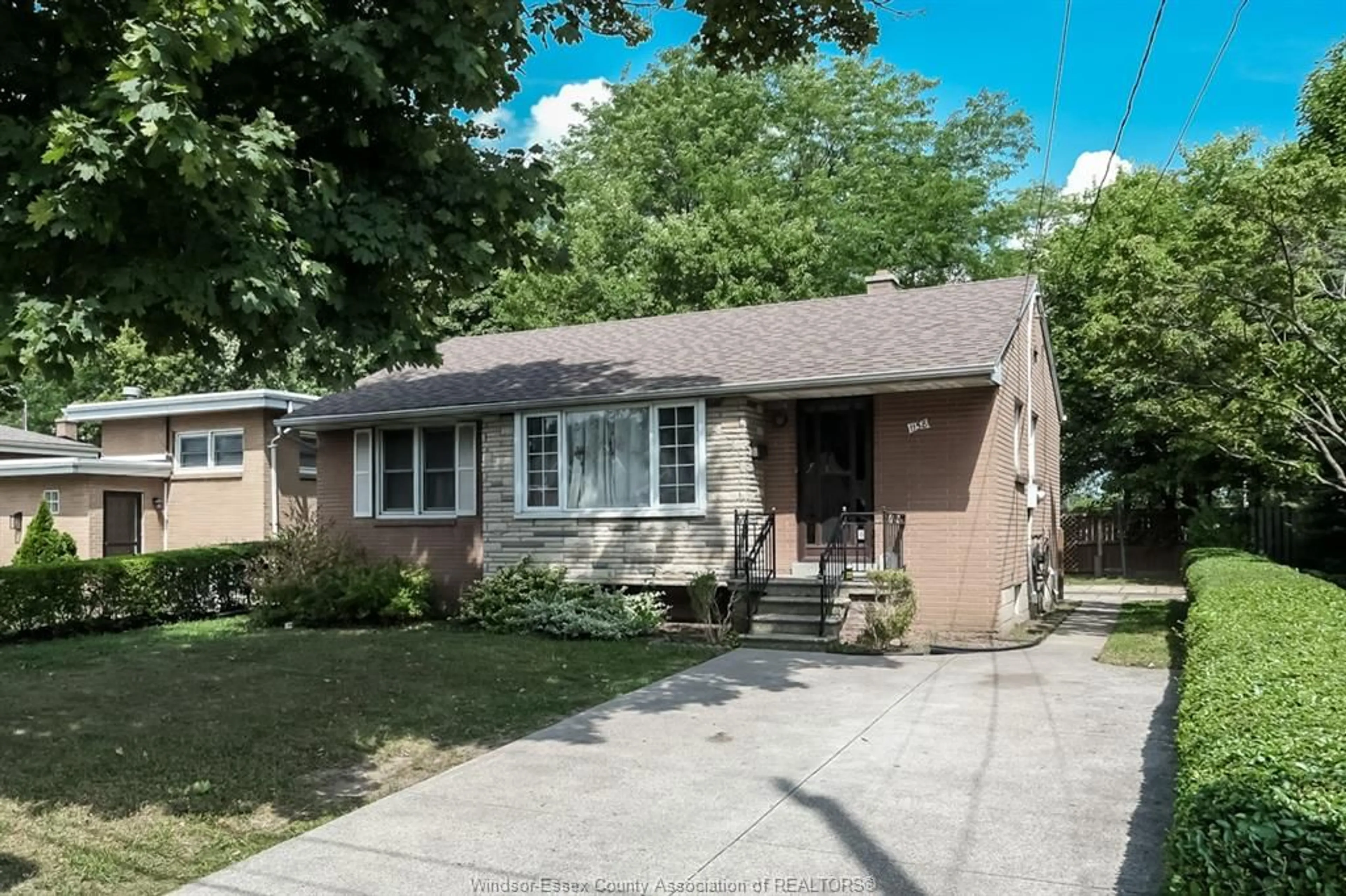 Home with brick exterior material, street for 1158 DOT Ave, Windsor Ontario N9C 3J1