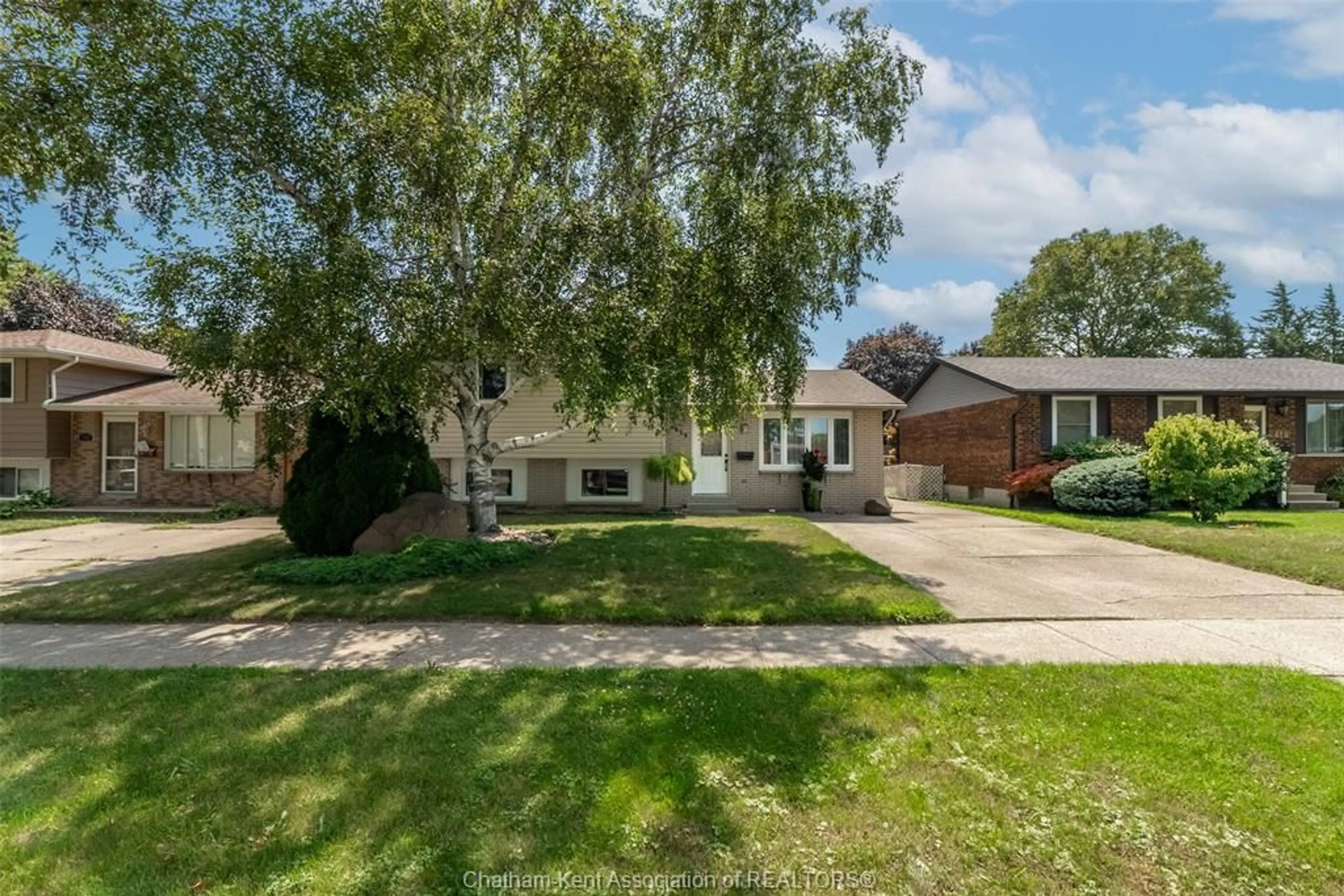 A pic from outside/outdoor area/front of a property/back of a property/a pic from drone, street for 414 McNaughton Ave, Chatham Ontario N7L 2G9