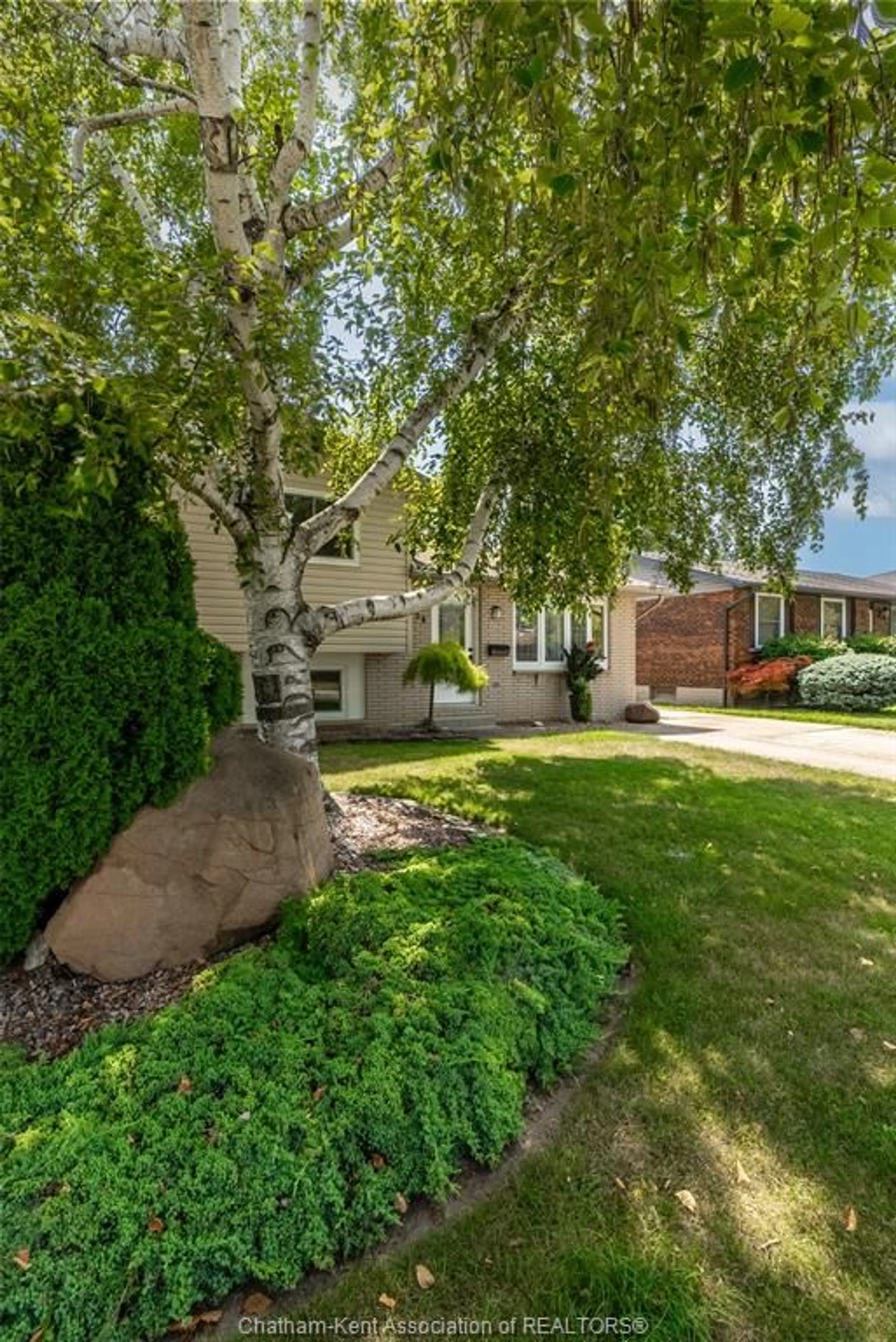Home with brick exterior material, street for 414 McNaughton Ave, Chatham Ontario N7L 2G9