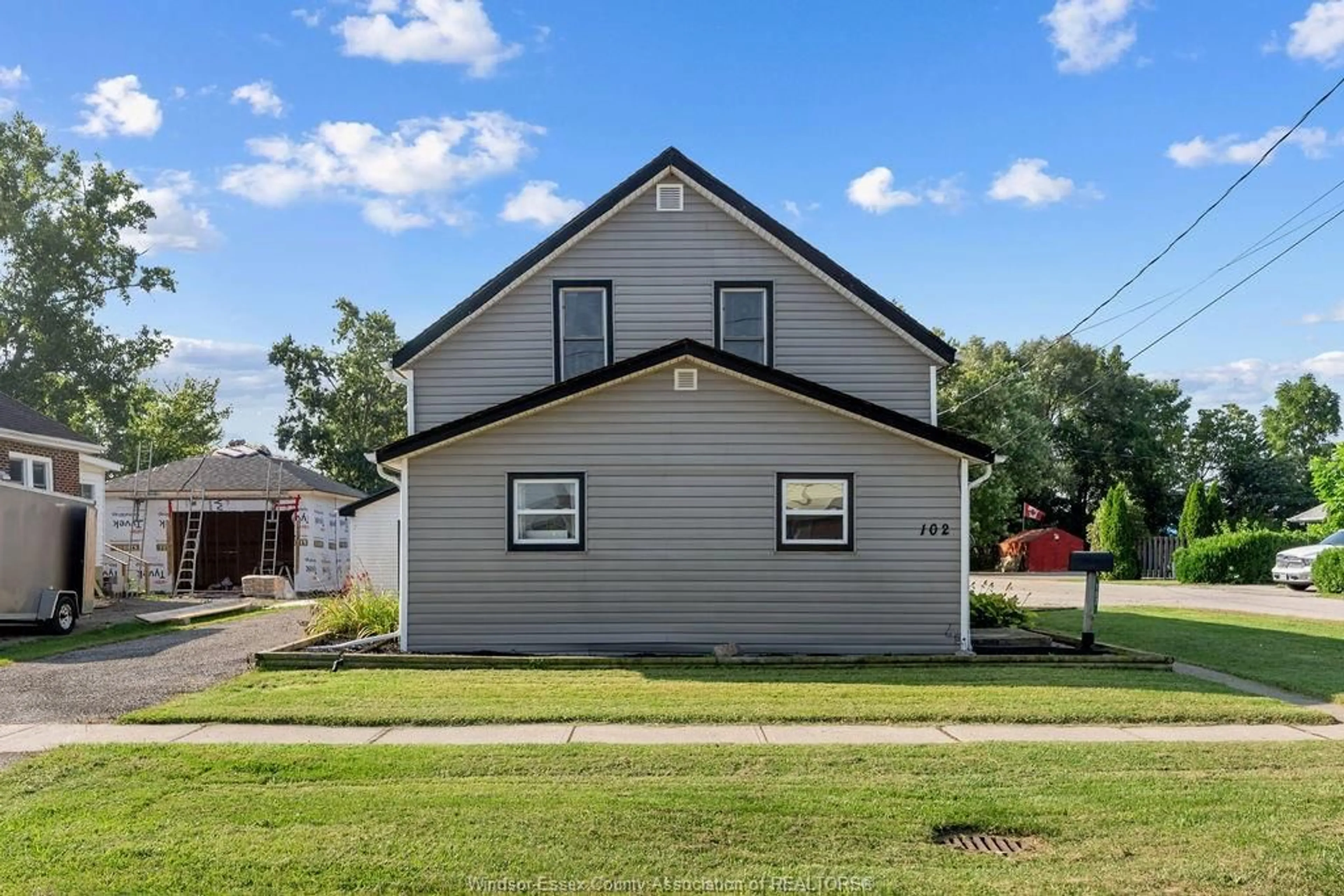 Home with vinyl exterior material, street for 102 CAMERON, Essex Ontario N8M 2L5