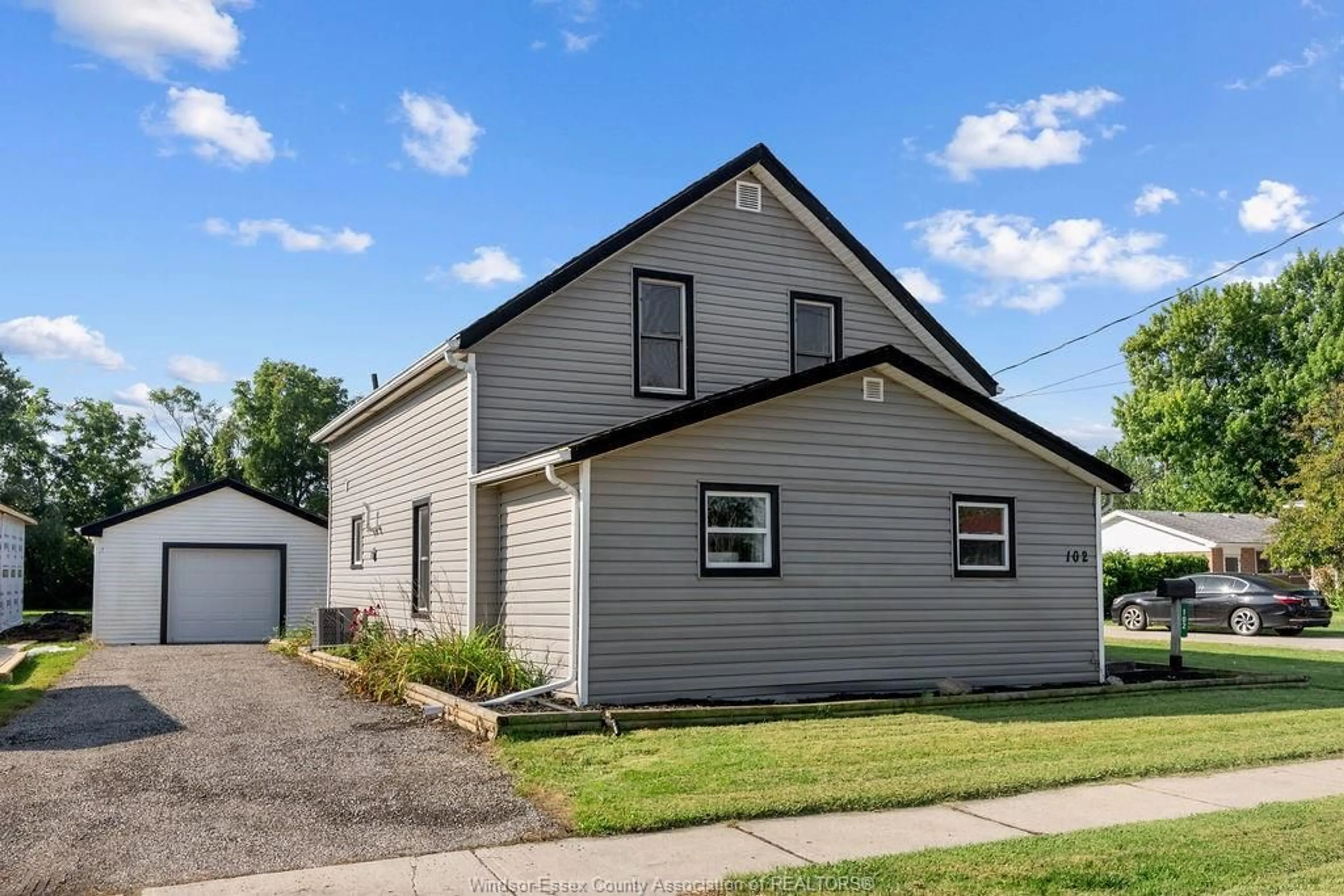 Home with vinyl exterior material, street for 102 CAMERON, Essex Ontario N8M 2L5
