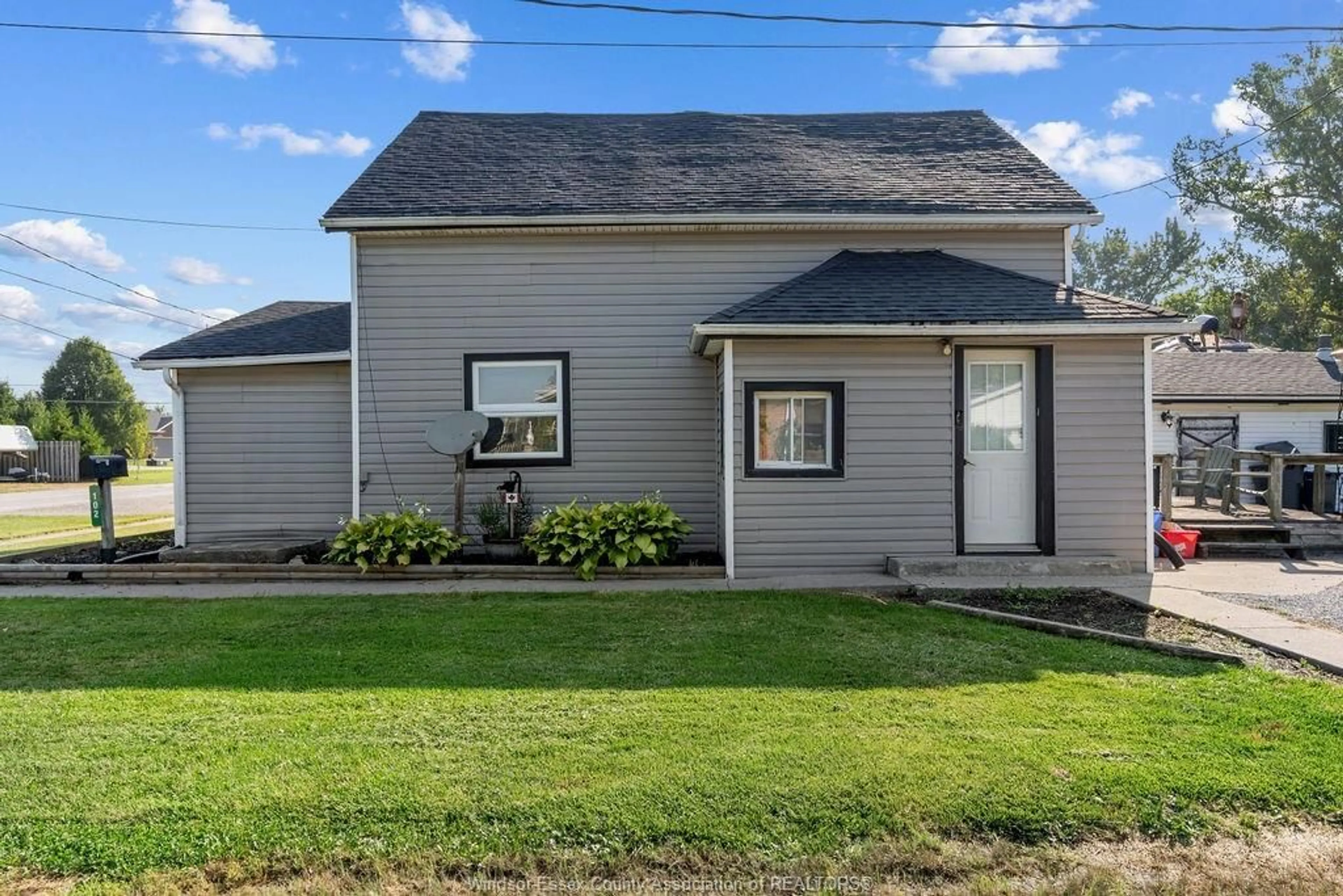 Home with vinyl exterior material, street for 102 CAMERON, Essex Ontario N8M 2L5