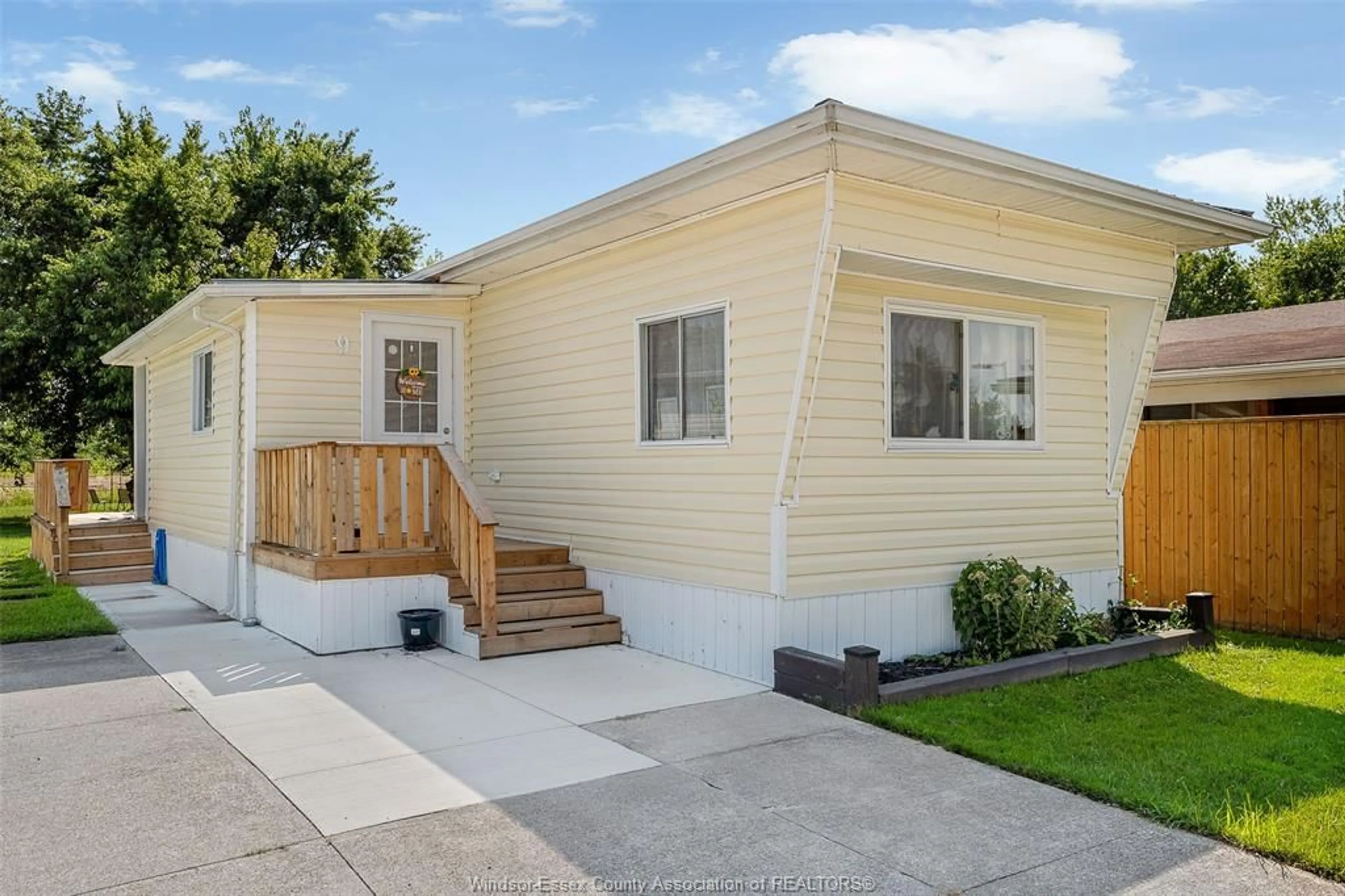 Home with vinyl exterior material, street for 9 MAPLE Dr, McGregor Ontario N0R 1J0