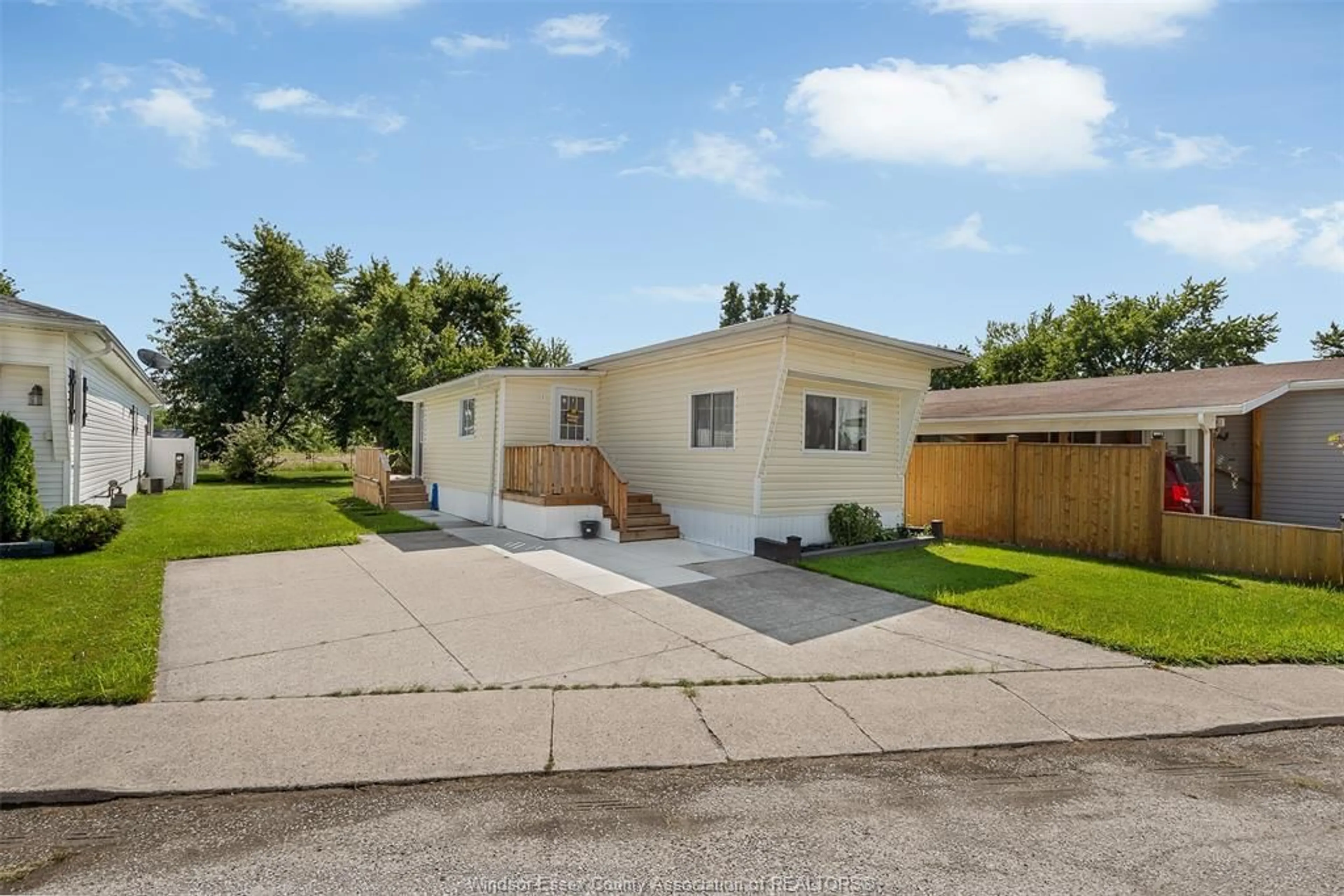 A pic from outside/outdoor area/front of a property/back of a property/a pic from drone, street for 9 MAPLE Dr, McGregor Ontario N0R 1J0