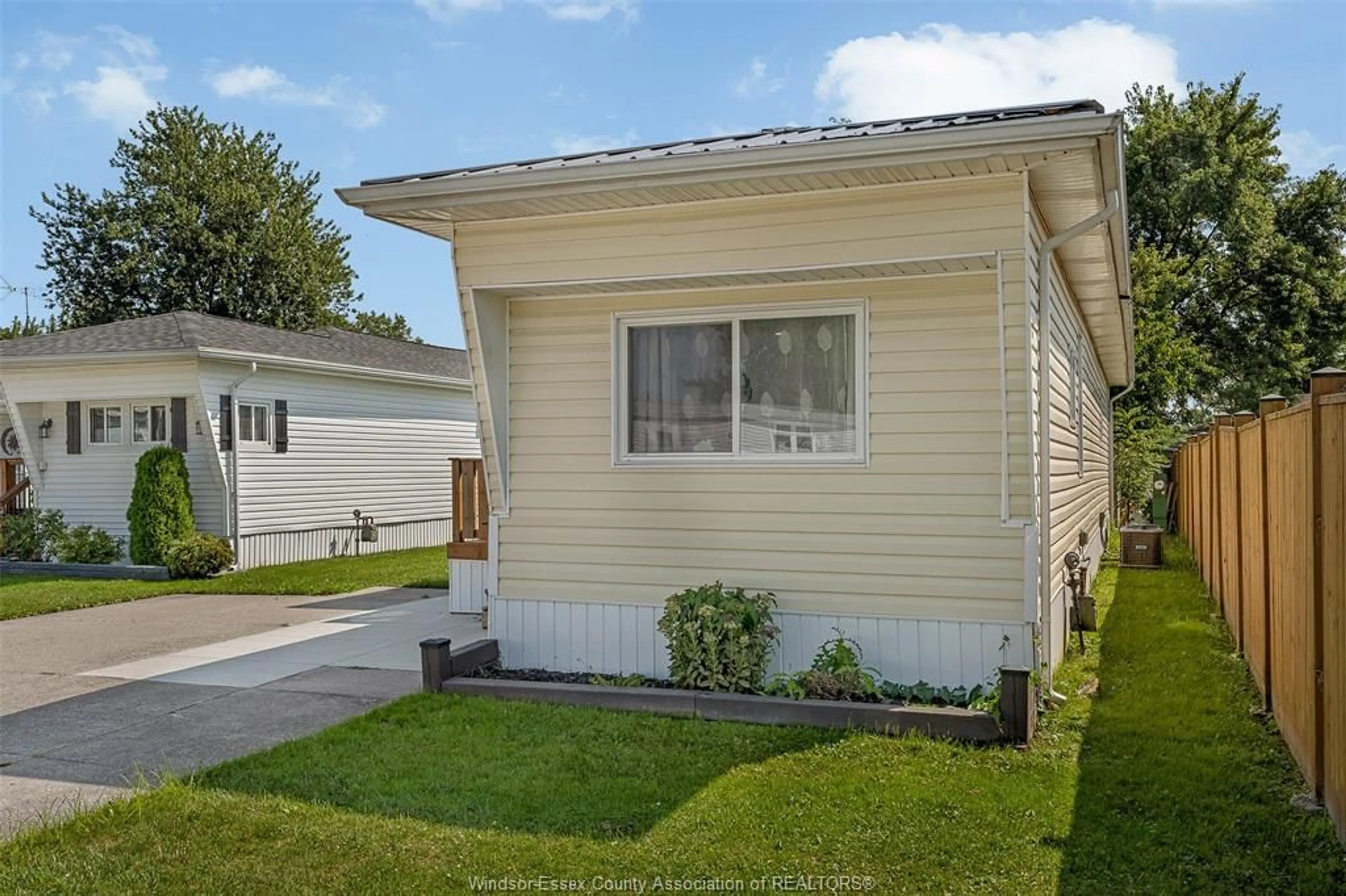 Home with vinyl exterior material, street for 9 MAPLE Dr, McGregor Ontario N0R 1J0