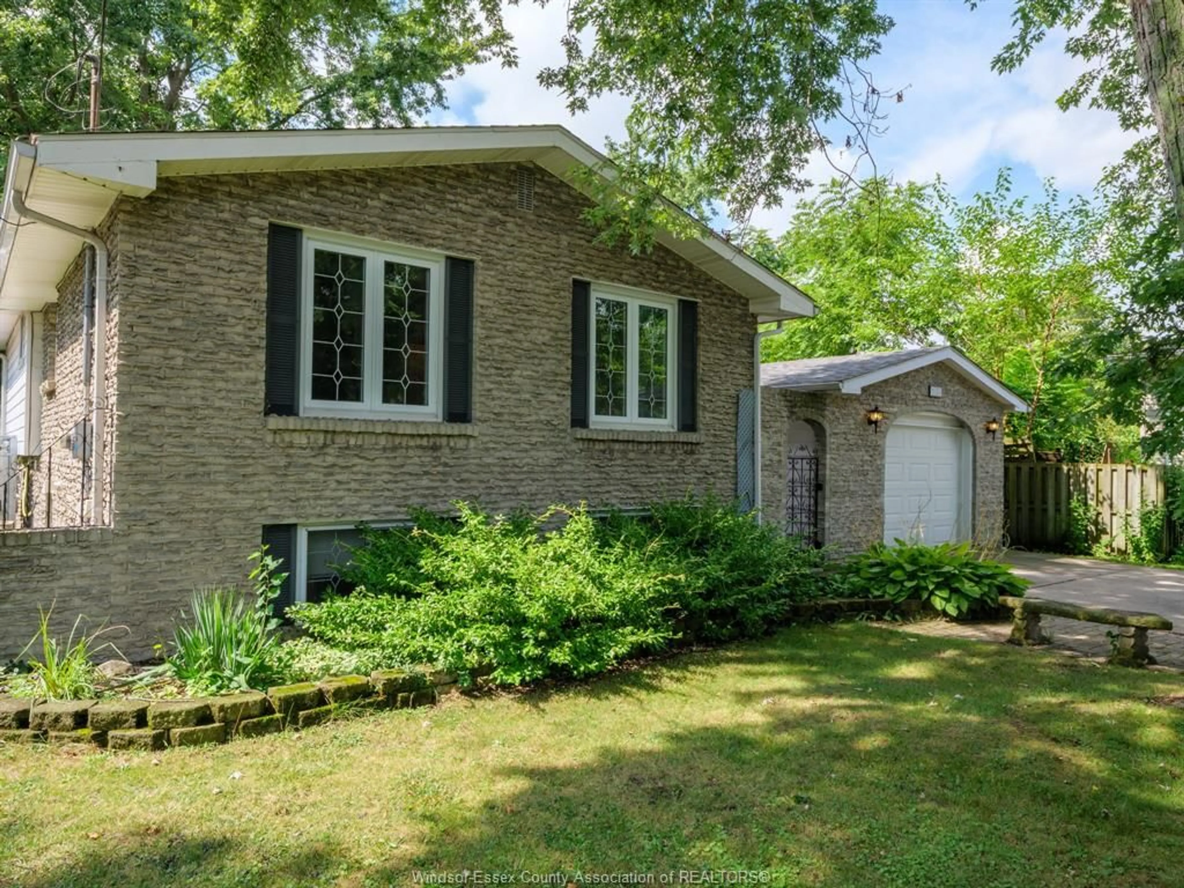 Home with brick exterior material, street for 1050 REAUME Rd, LaSalle Ontario N9J 1C1