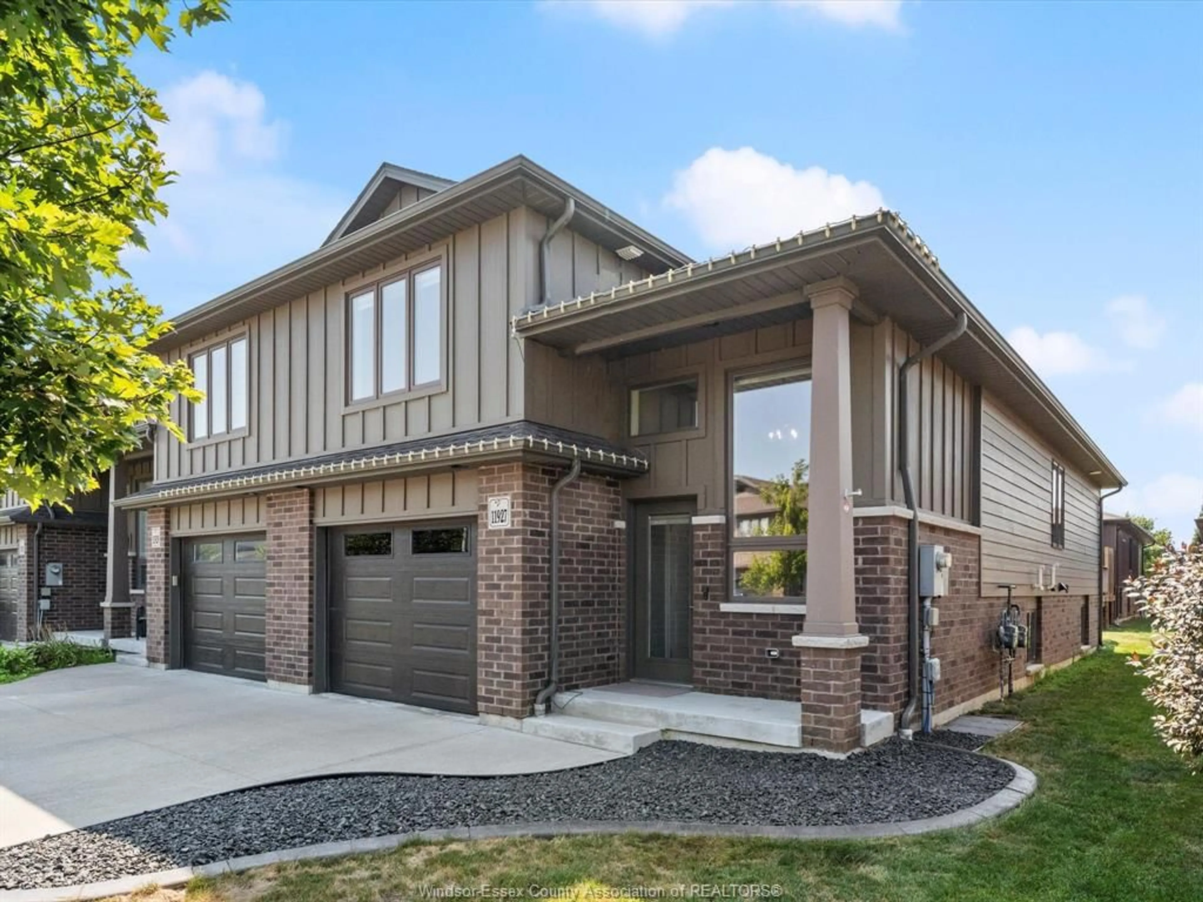 Home with brick exterior material, street for 11927 MAITLAND Ave, Windsor Ontario N8P 0A9