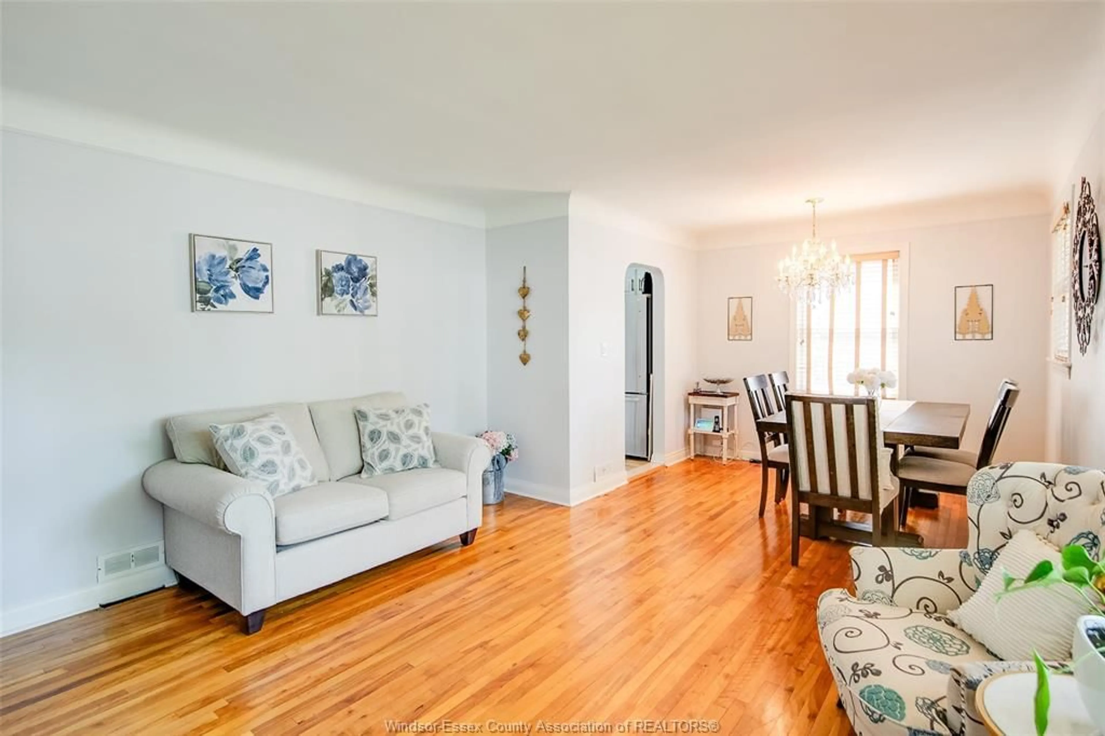 Living room with furniture, wood/laminate floor for 3222 Curry, Windsor Ontario N9E 2T5