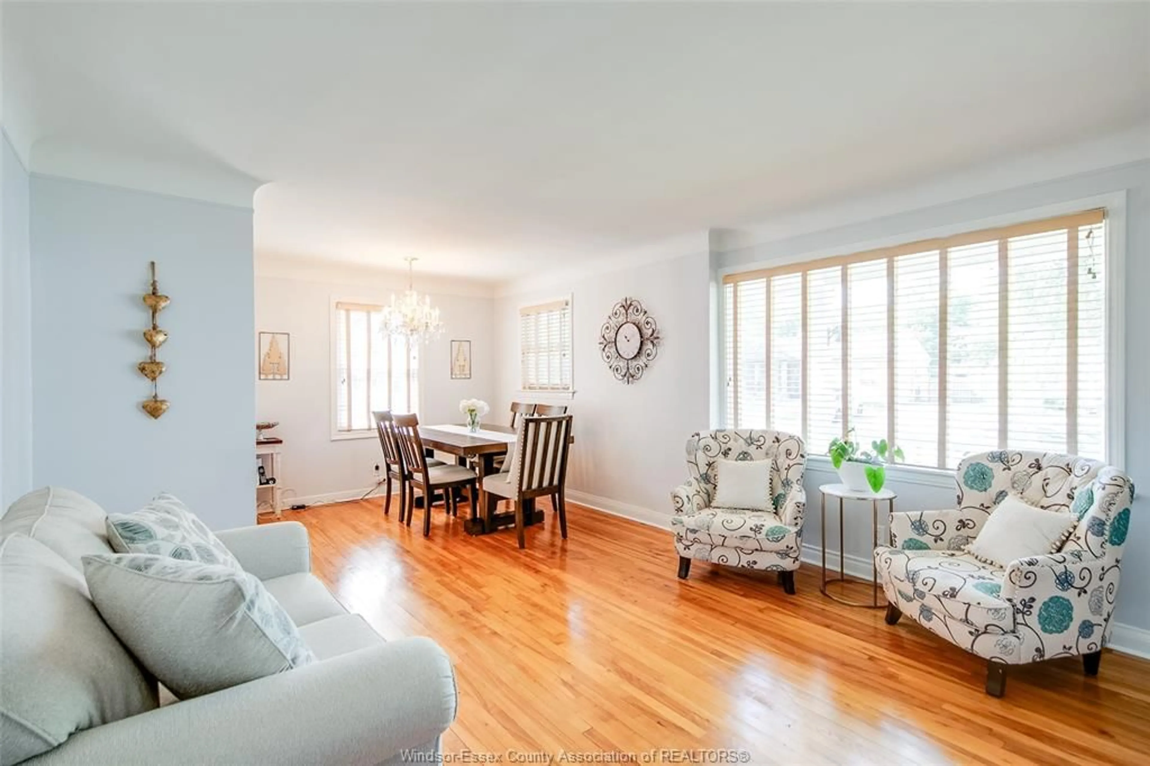 Living room with furniture, wood/laminate floor for 3222 Curry, Windsor Ontario N9E 2T5
