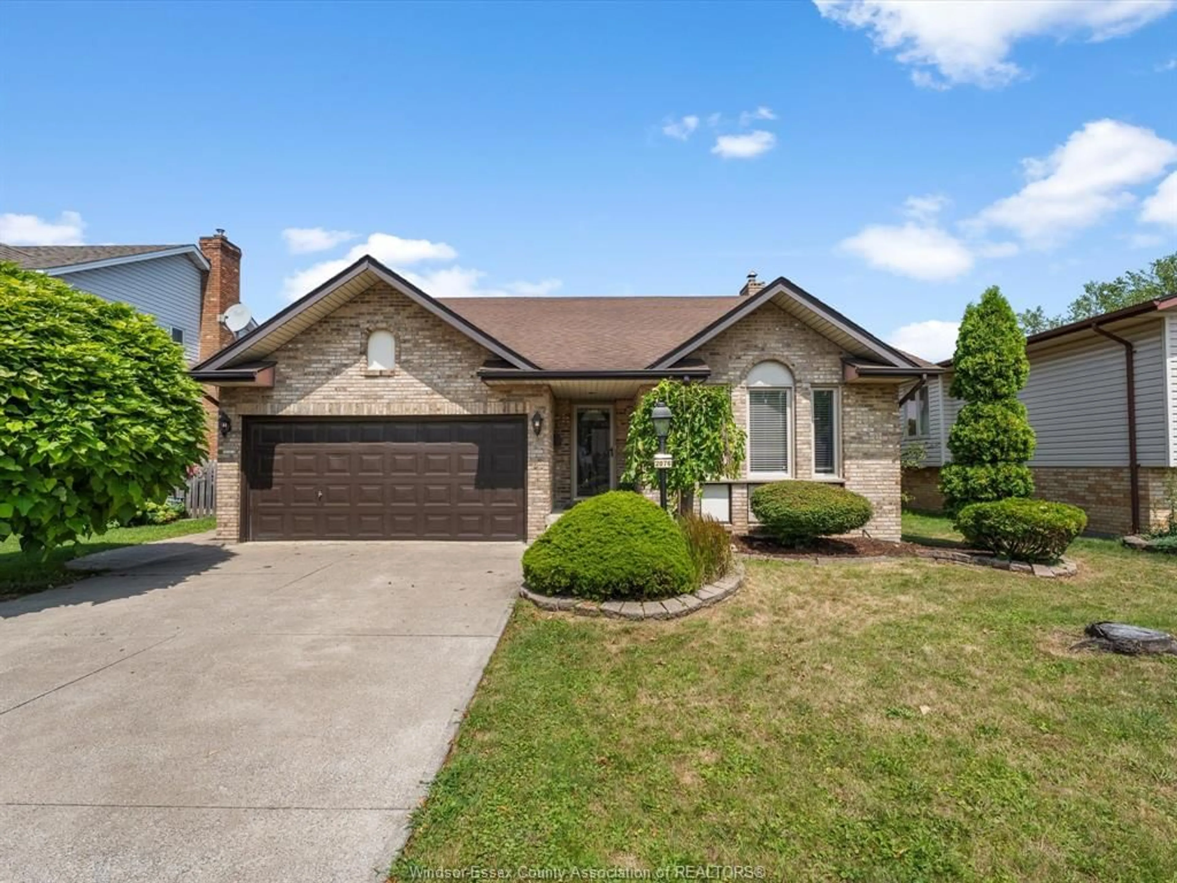 Home with brick exterior material, street for 2076 EDGEMORE Ave, LaSalle Ontario N9H 2E1