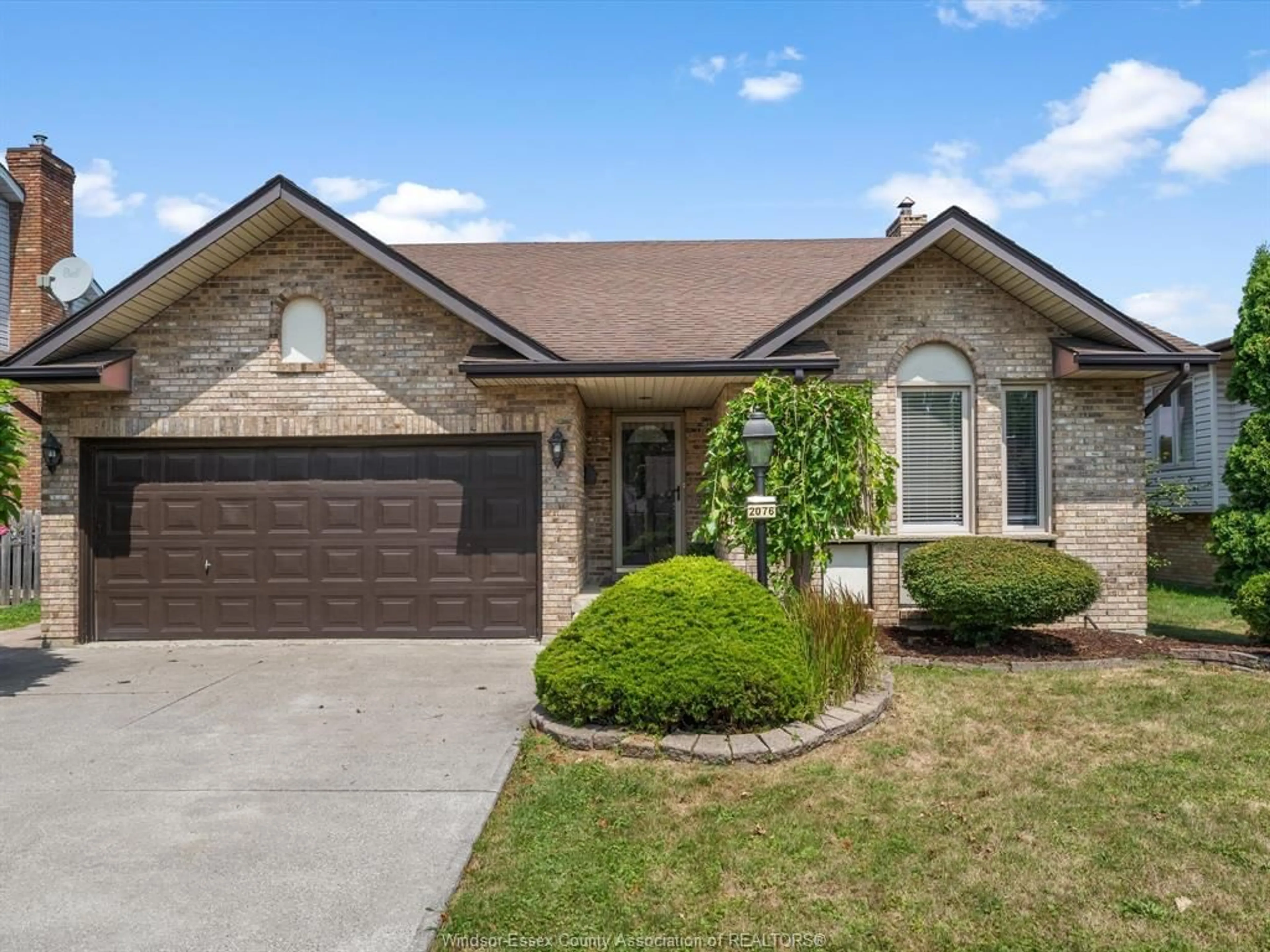 Home with brick exterior material, street for 2076 EDGEMORE Ave, LaSalle Ontario N9H 2E1