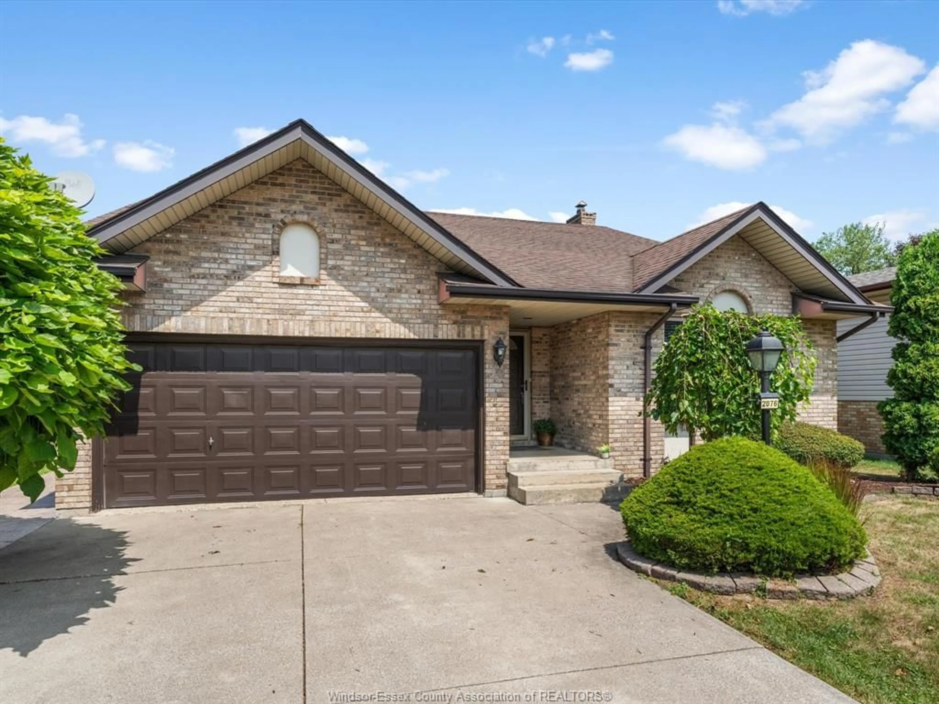 Home with brick exterior material, street for 2076 EDGEMORE Ave, LaSalle Ontario N9H 2E1