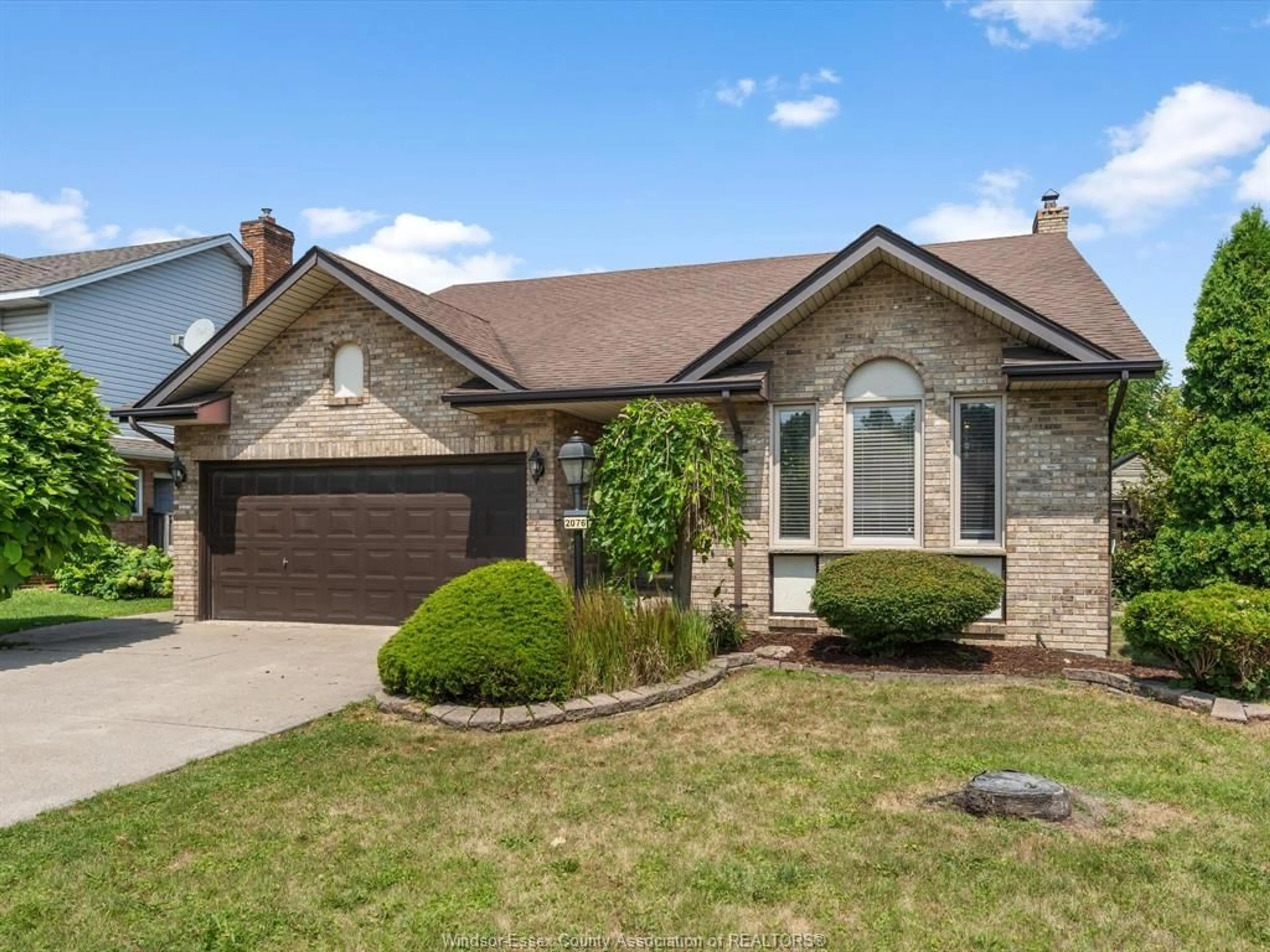 Home with brick exterior material, street for 2076 EDGEMORE Ave, LaSalle Ontario N9H 2E1