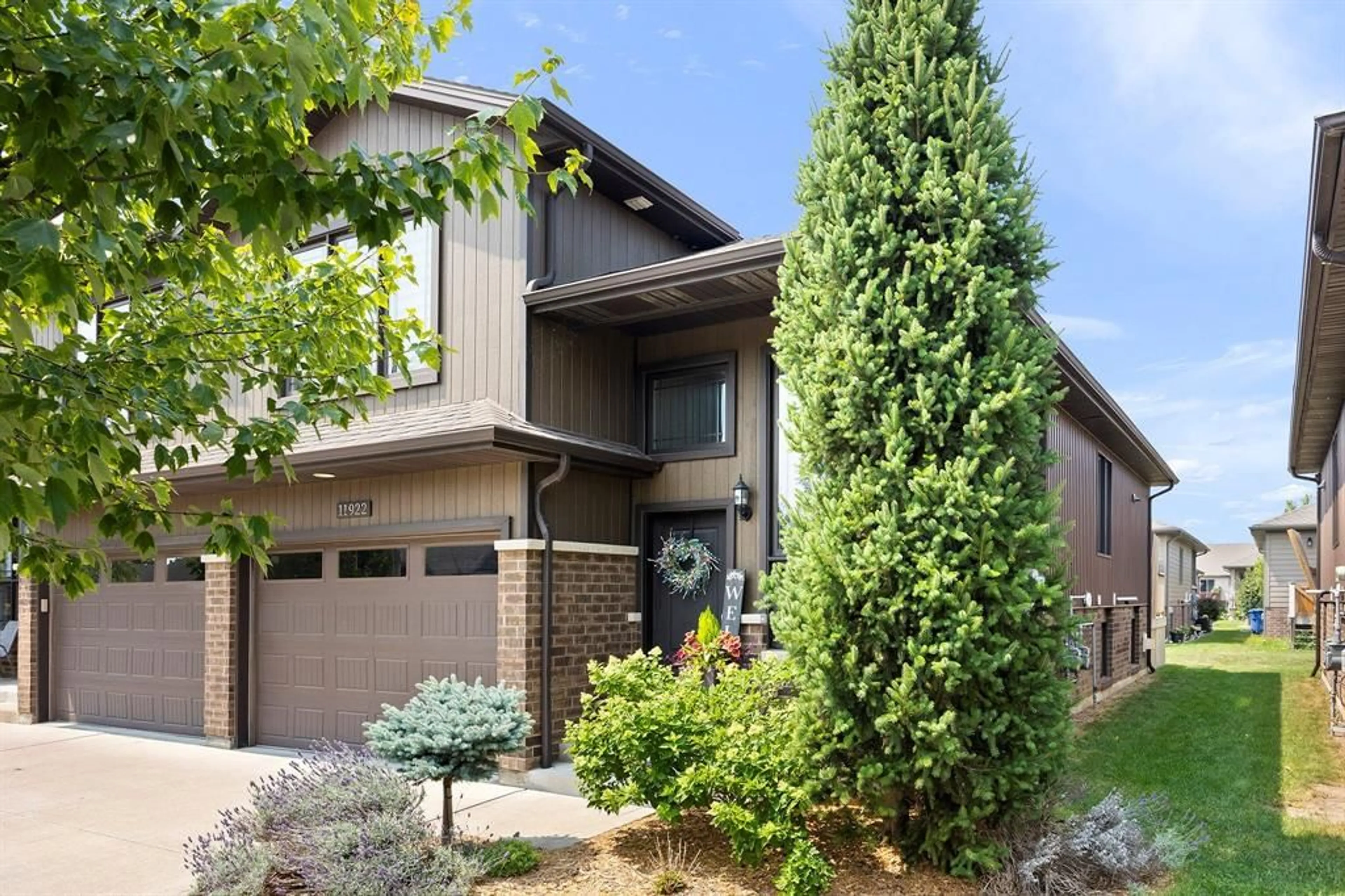 Home with brick exterior material, street for 11922 THISTLEDOWN Ave, Windsor Ontario N8P 0B6