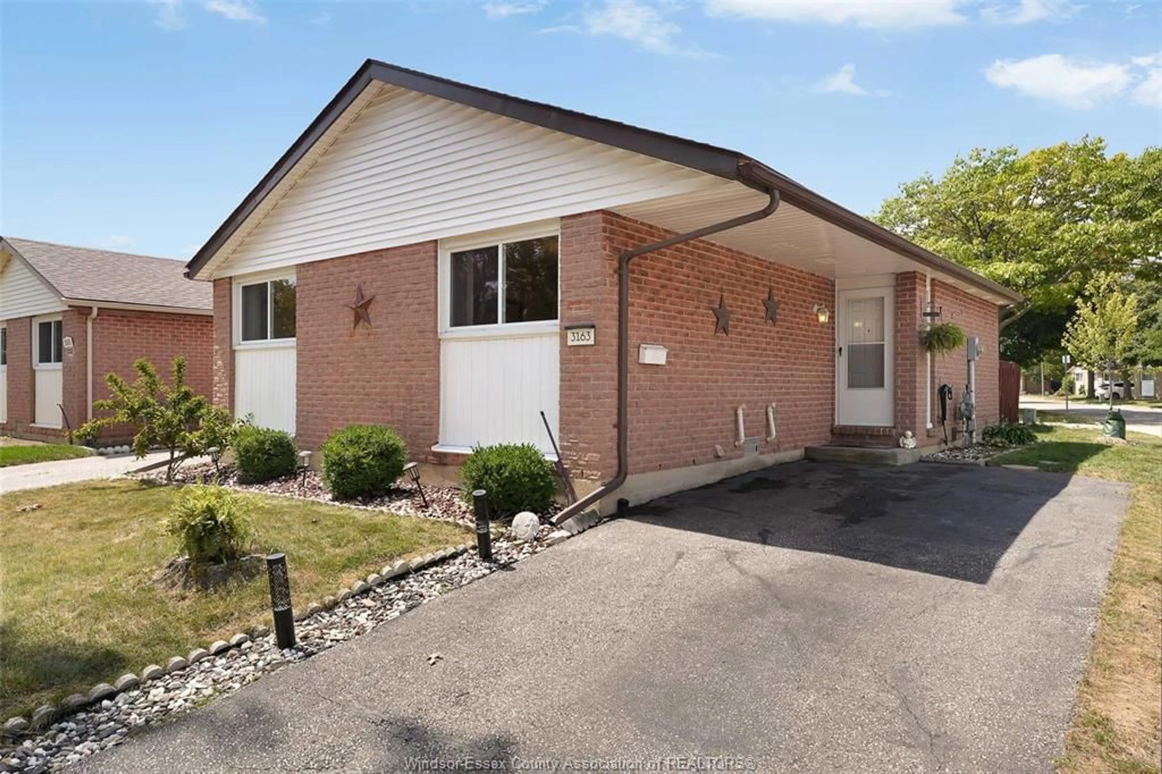 Home with brick exterior material, street for 3163 FOREST GLADE Dr, Windsor Ontario N8R 1W7