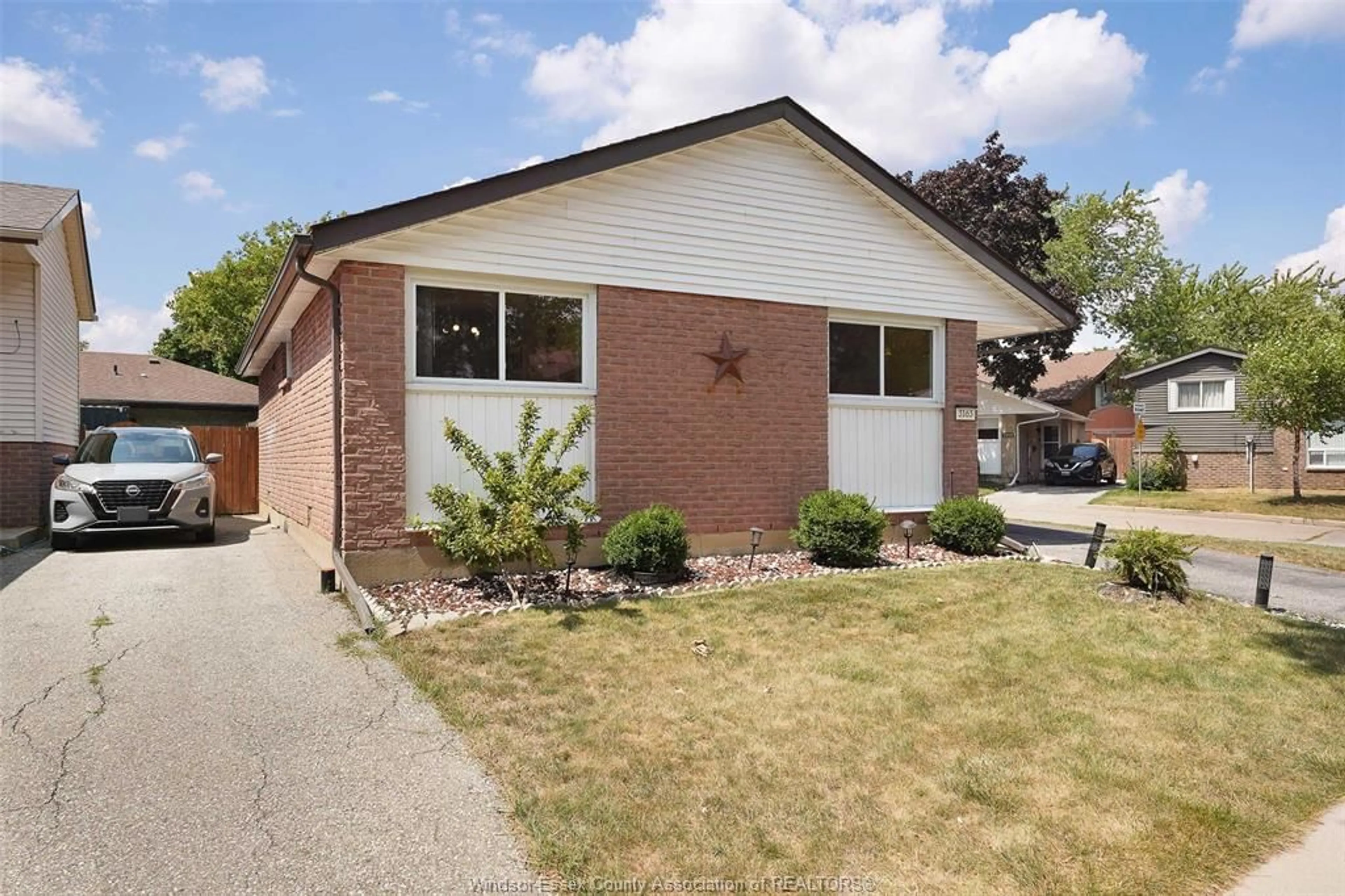 Home with brick exterior material, street for 3163 FOREST GLADE Dr, Windsor Ontario N8R 1W7