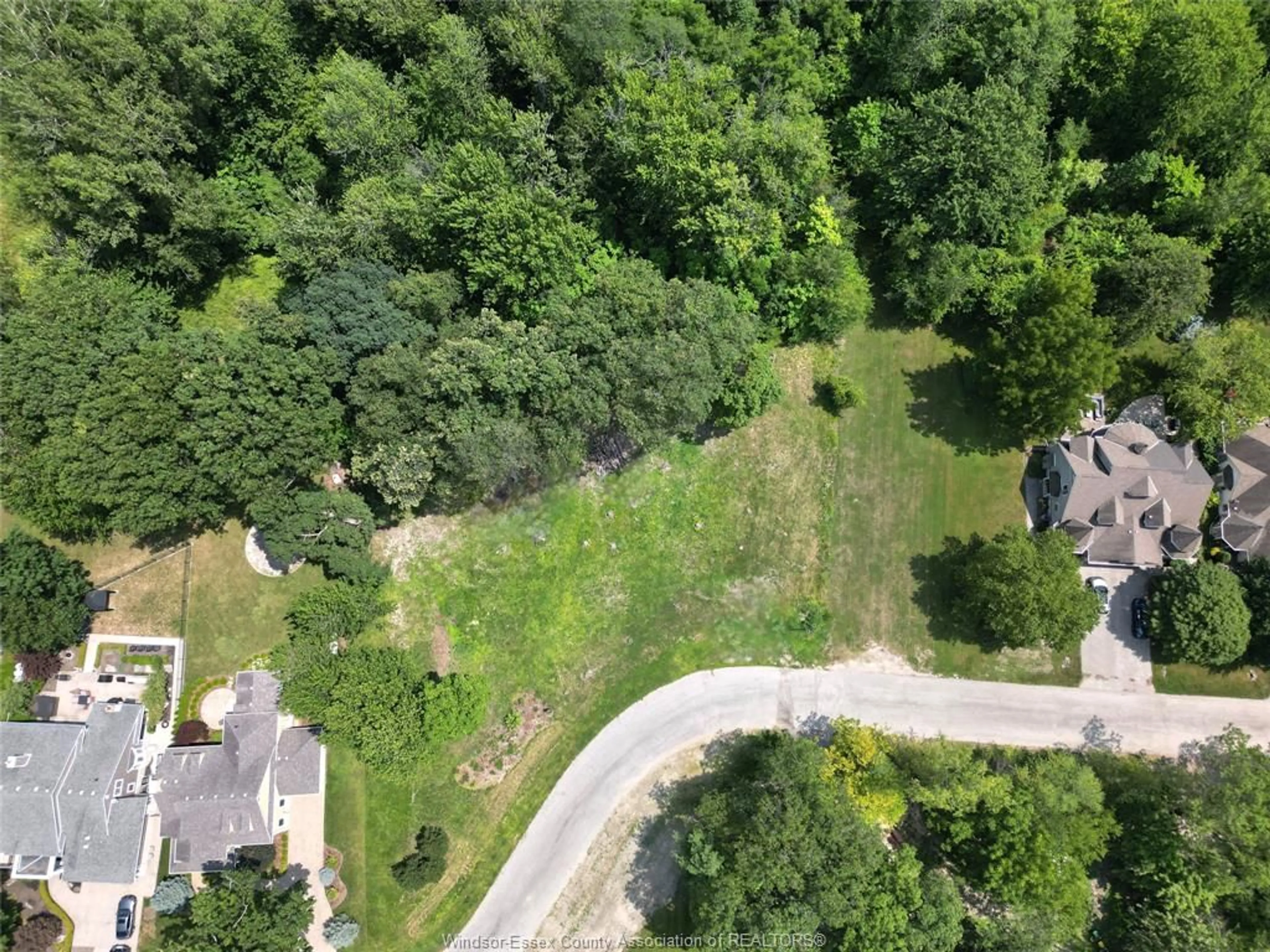 A pic from outside/outdoor area/front of a property/back of a property/a pic from drone, forest/trees view for 257 CRYSTAL BAY Dr, Amherstburg Ontario N9V 4A6