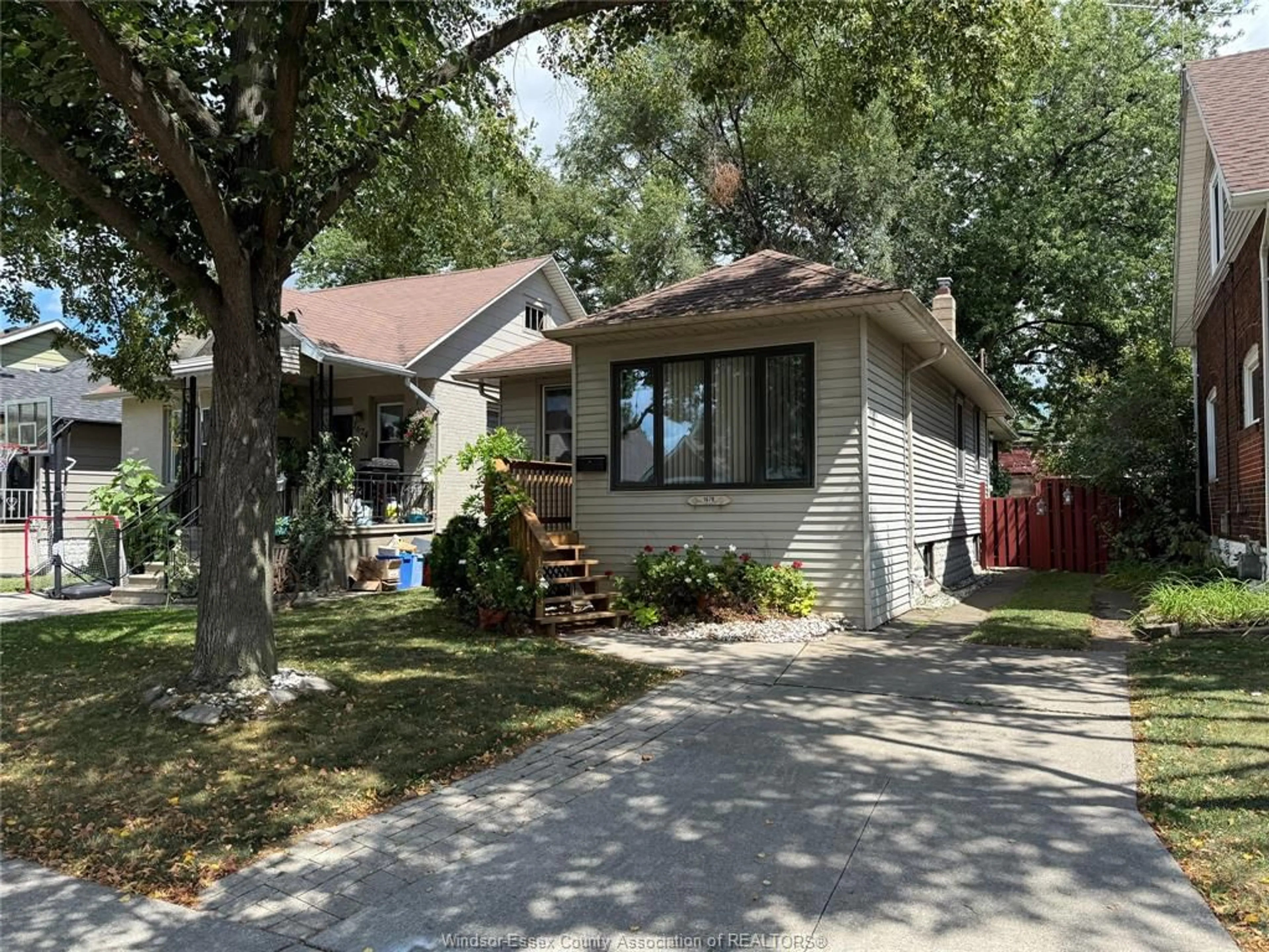 Home with vinyl exterior material, street for 1678 HALL Ave, Windsor Ontario N8X 4S1