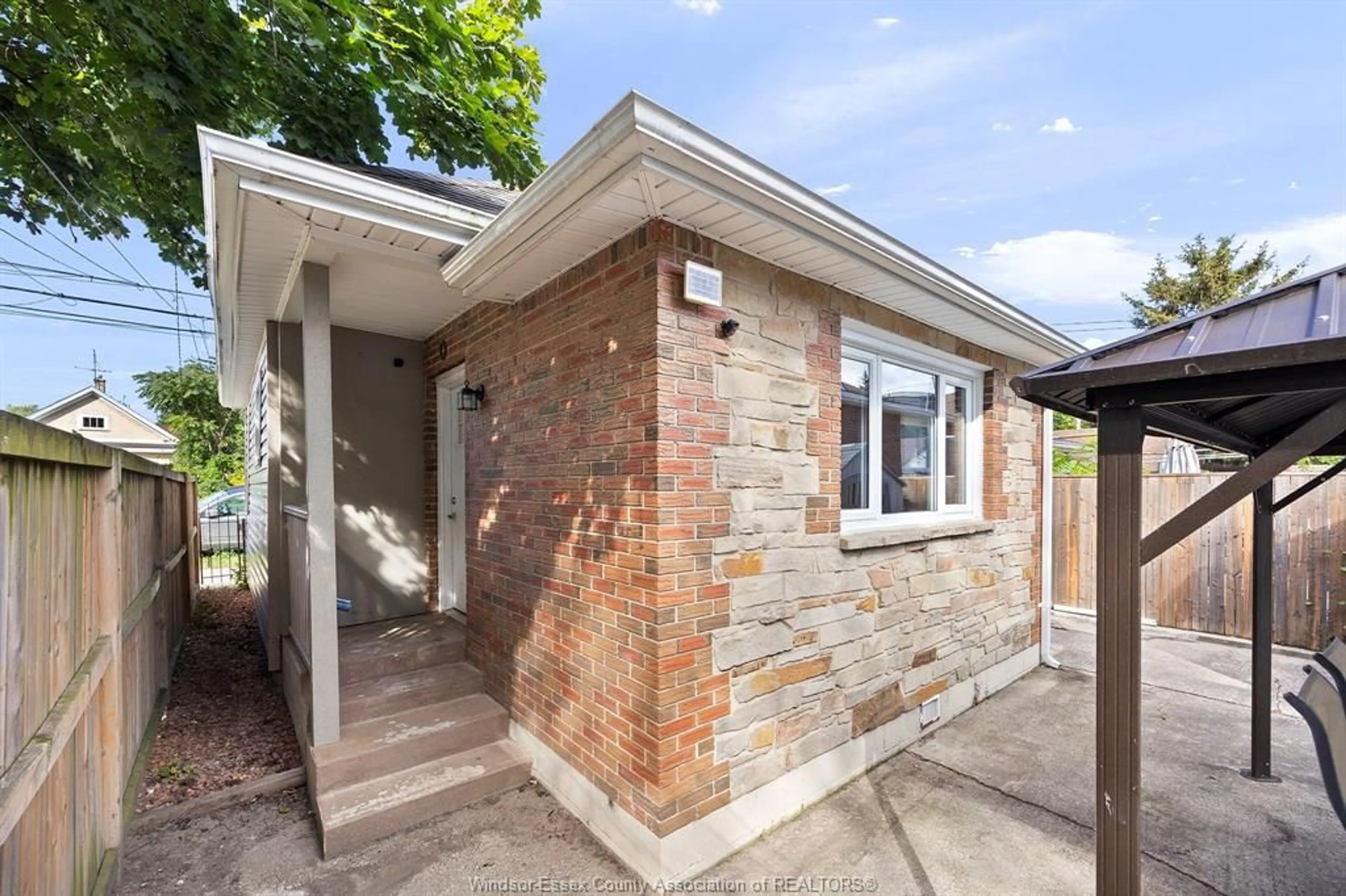 Home with brick exterior material, street for 1555 Gladstone, Windsor Ontario N8X 1Z3