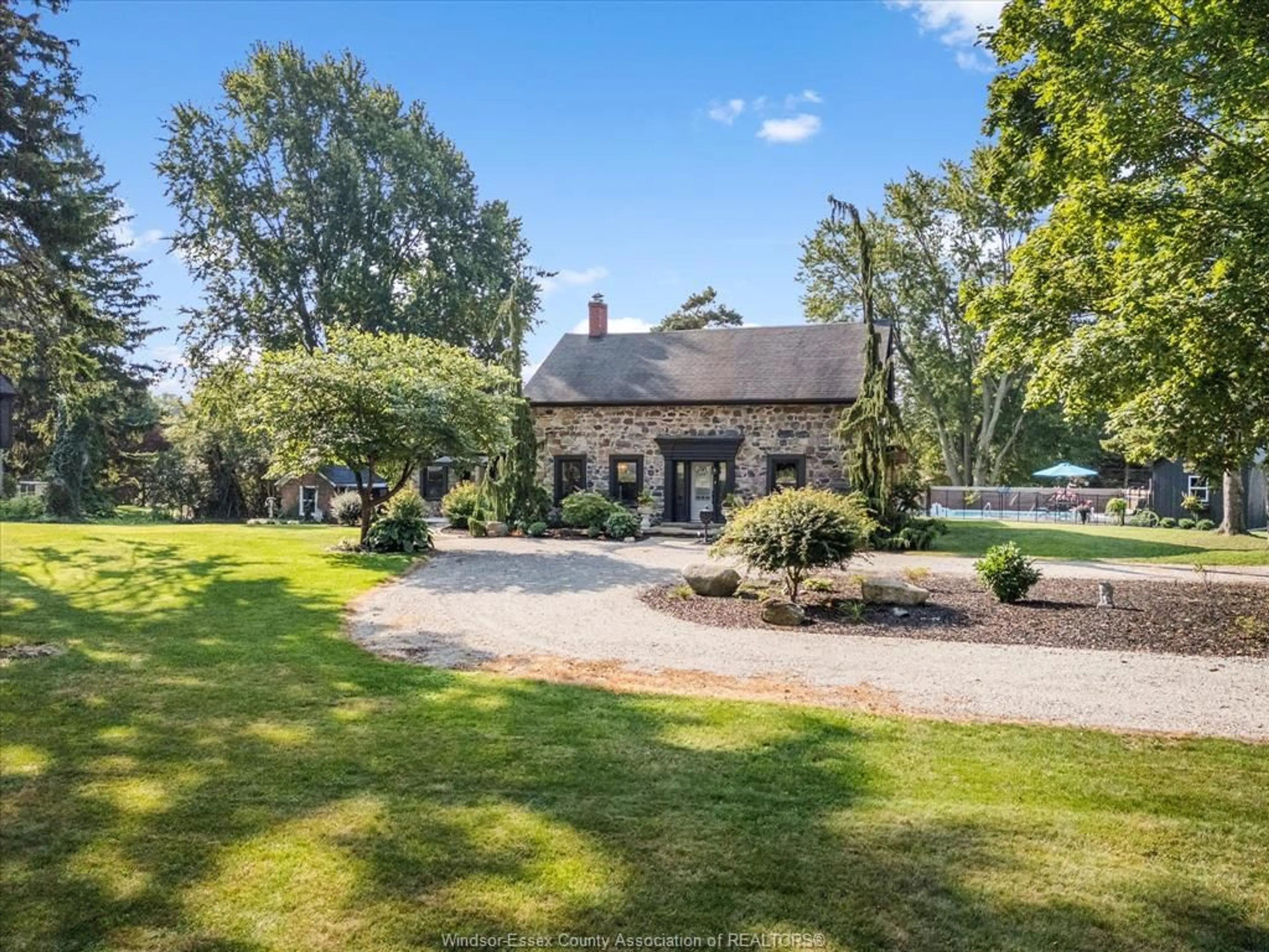 A pic from outside/outdoor area/front of a property/back of a property/a pic from drone, water/lake/river/ocean view for 1203 Seacliff Dr, Kingsville Ontario N9Y 2M1