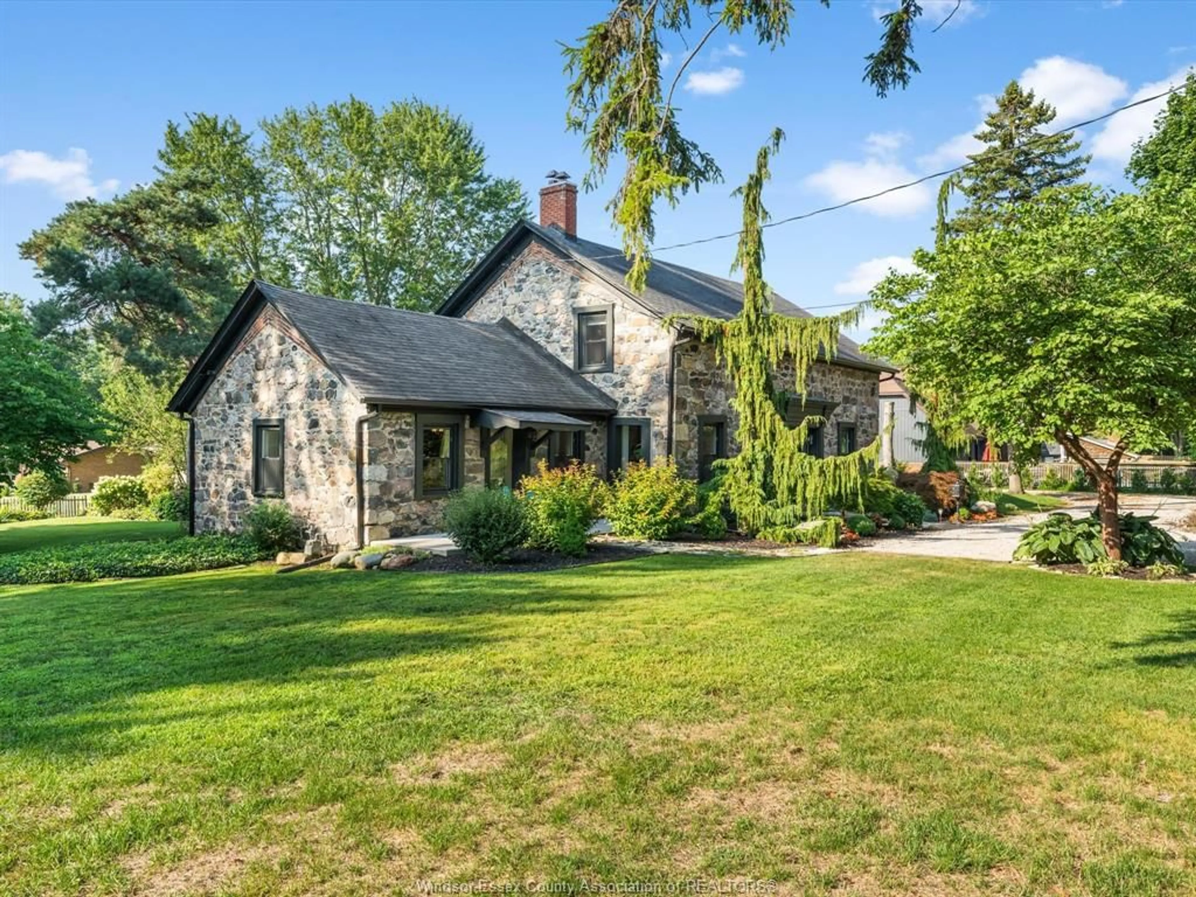A pic from outside/outdoor area/front of a property/back of a property/a pic from drone, street for 1203 Seacliff Dr, Kingsville Ontario N9Y 2M1