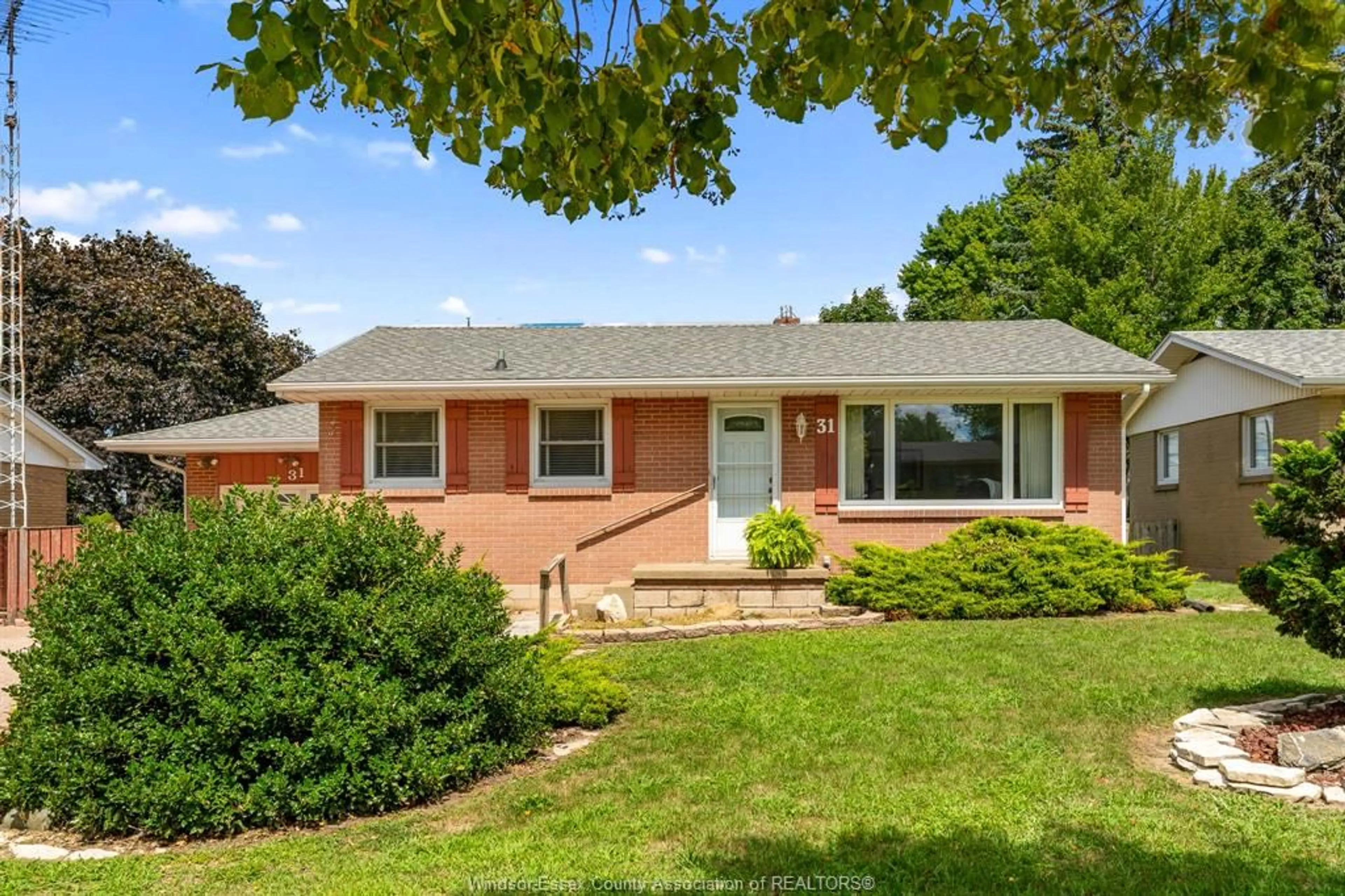 Home with brick exterior material, street for 31 William Ave, Leamington Ontario N8H 2G4