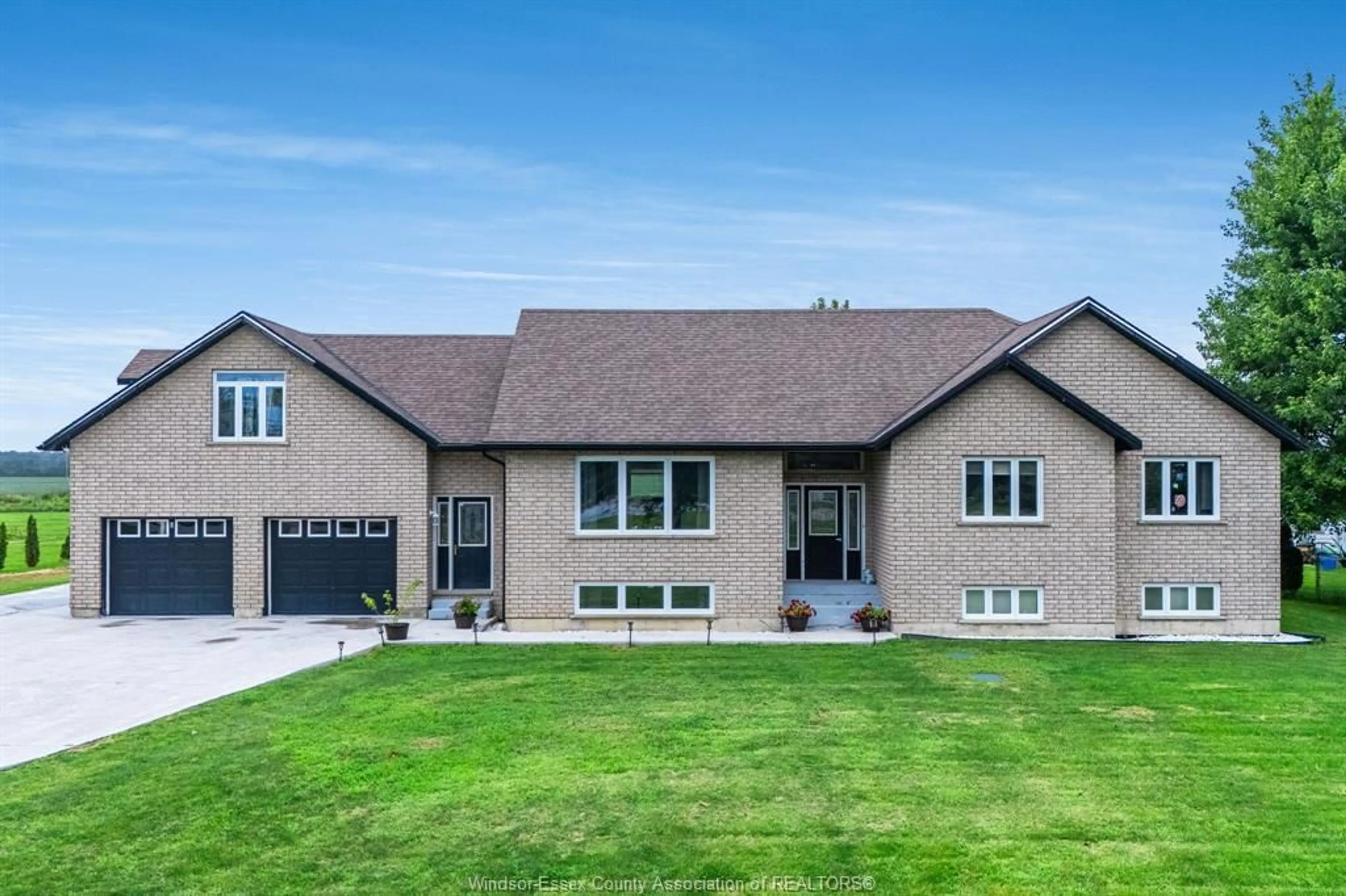 Home with brick exterior material, unknown for 833 Talbot Rd E, Leamington Ontario N0P 2P0