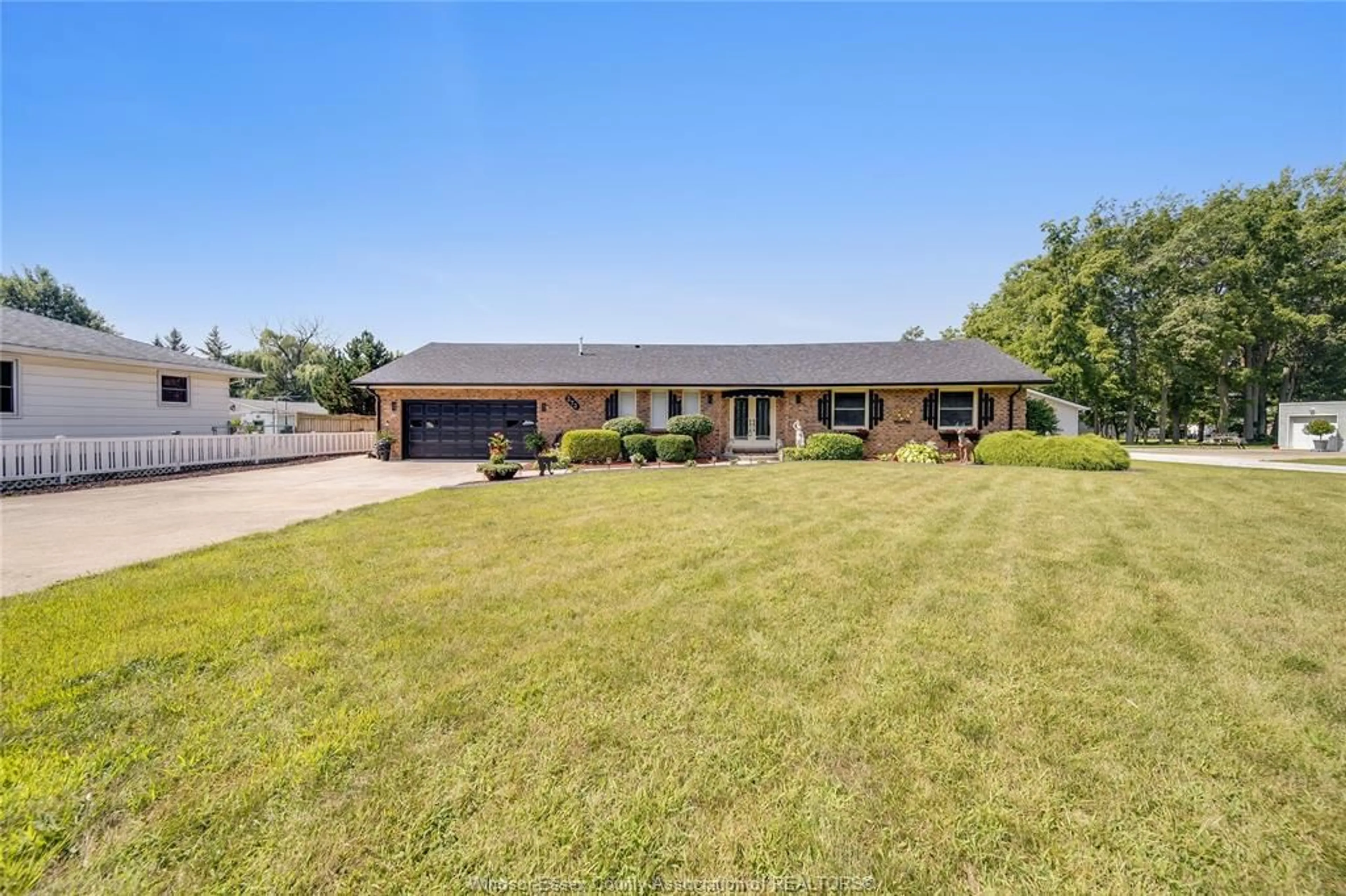 A pic from outside/outdoor area/front of a property/back of a property/a pic from drone, street for 373 COUNTY RD 34, Kingsville Ontario N8M 2X5