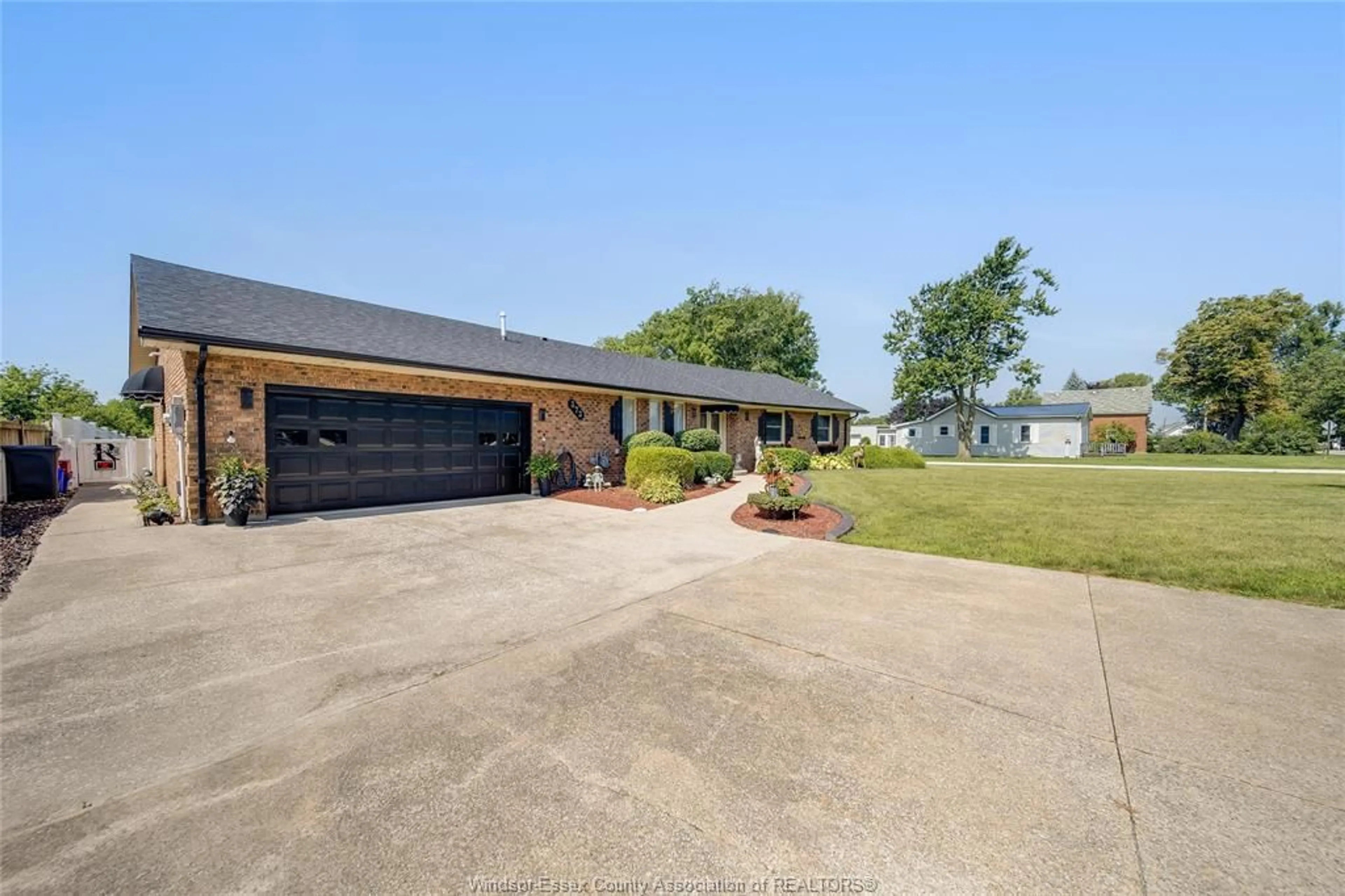 A pic from outside/outdoor area/front of a property/back of a property/a pic from drone, street for 373 COUNTY RD 34, Kingsville Ontario N8M 2X5