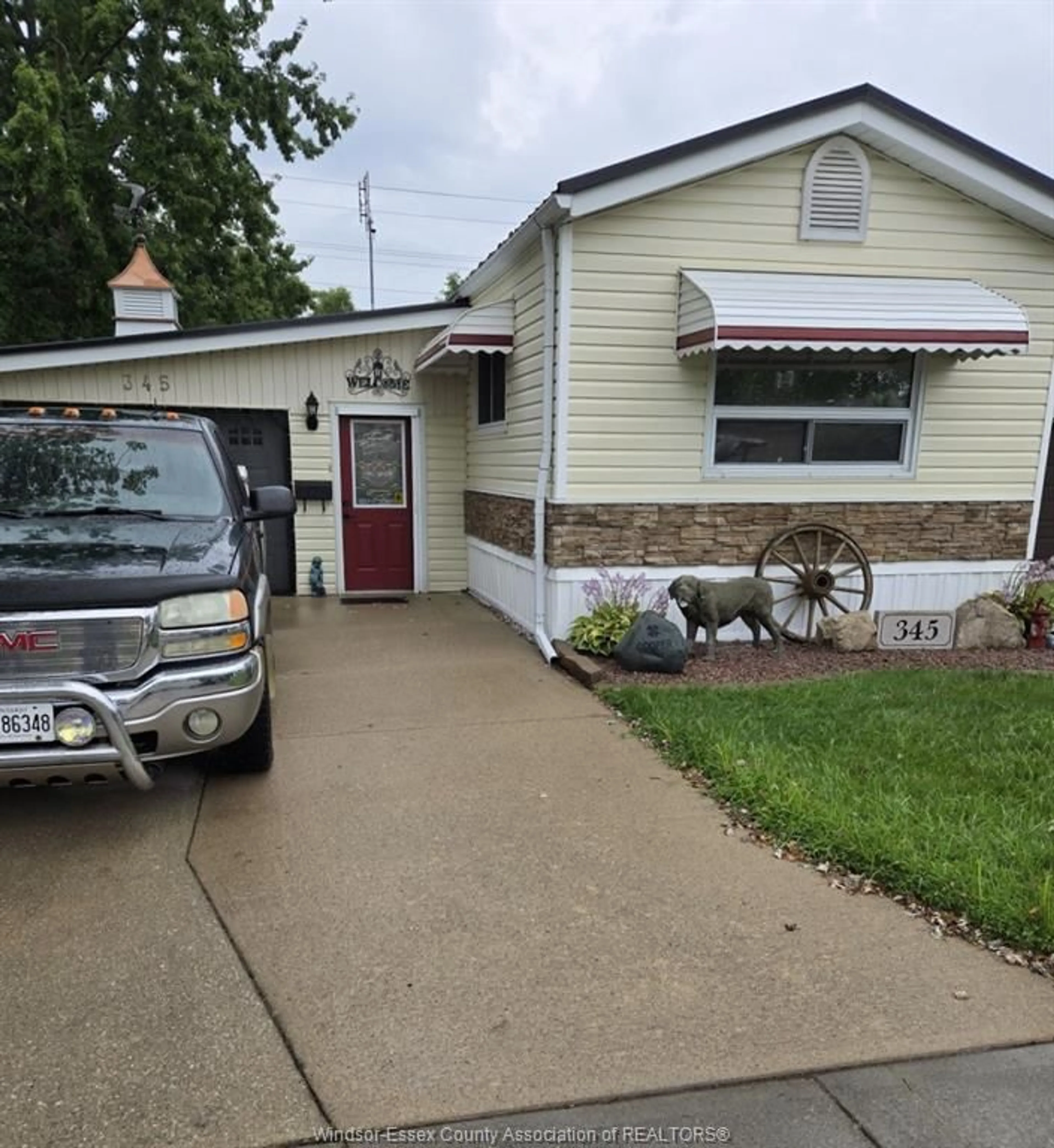 Home with vinyl exterior material, street for 345 DREW, Essex Ontario N8M 2Z9