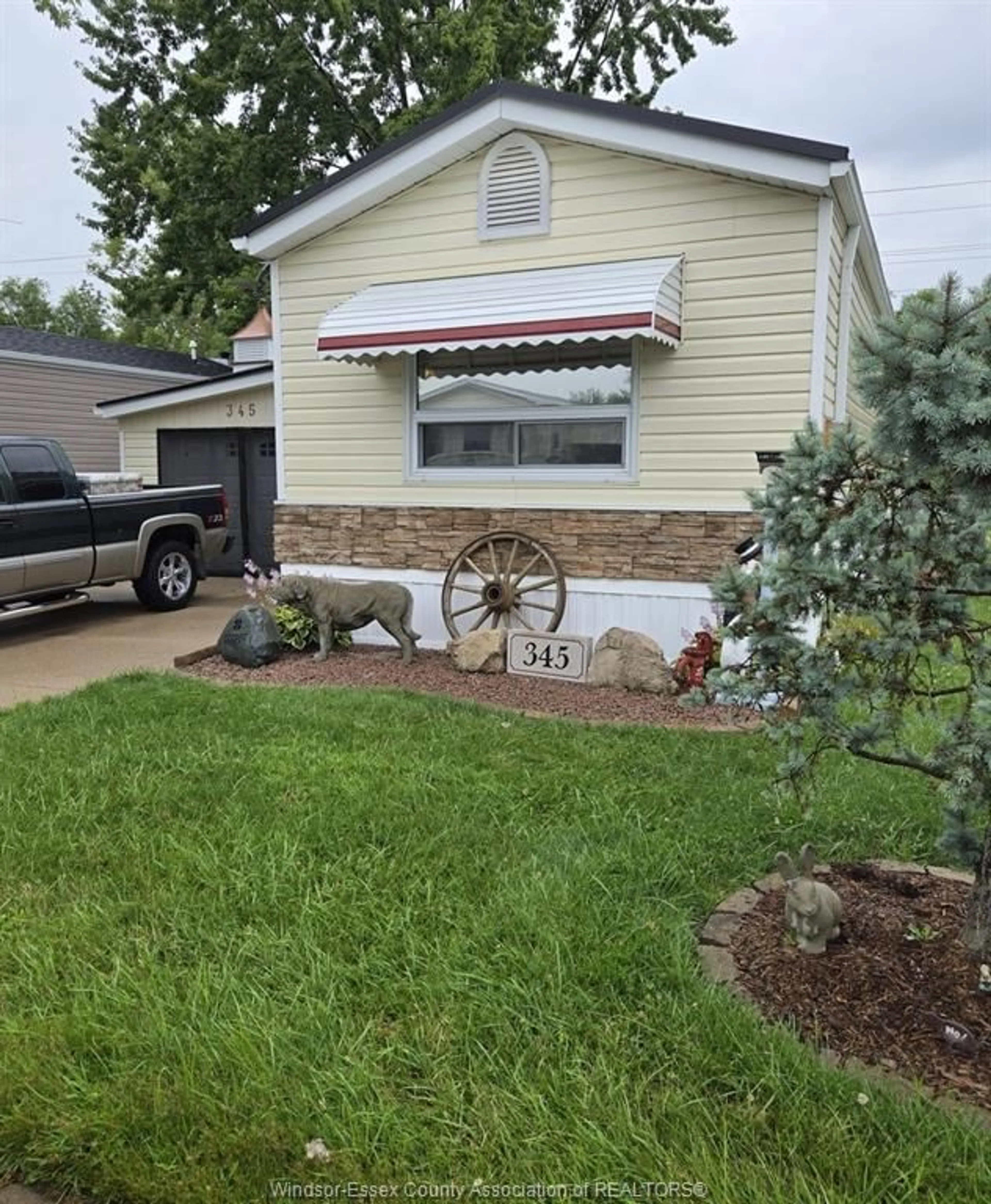 Home with vinyl exterior material, street for 345 DREW, Essex Ontario N8M 2Z9