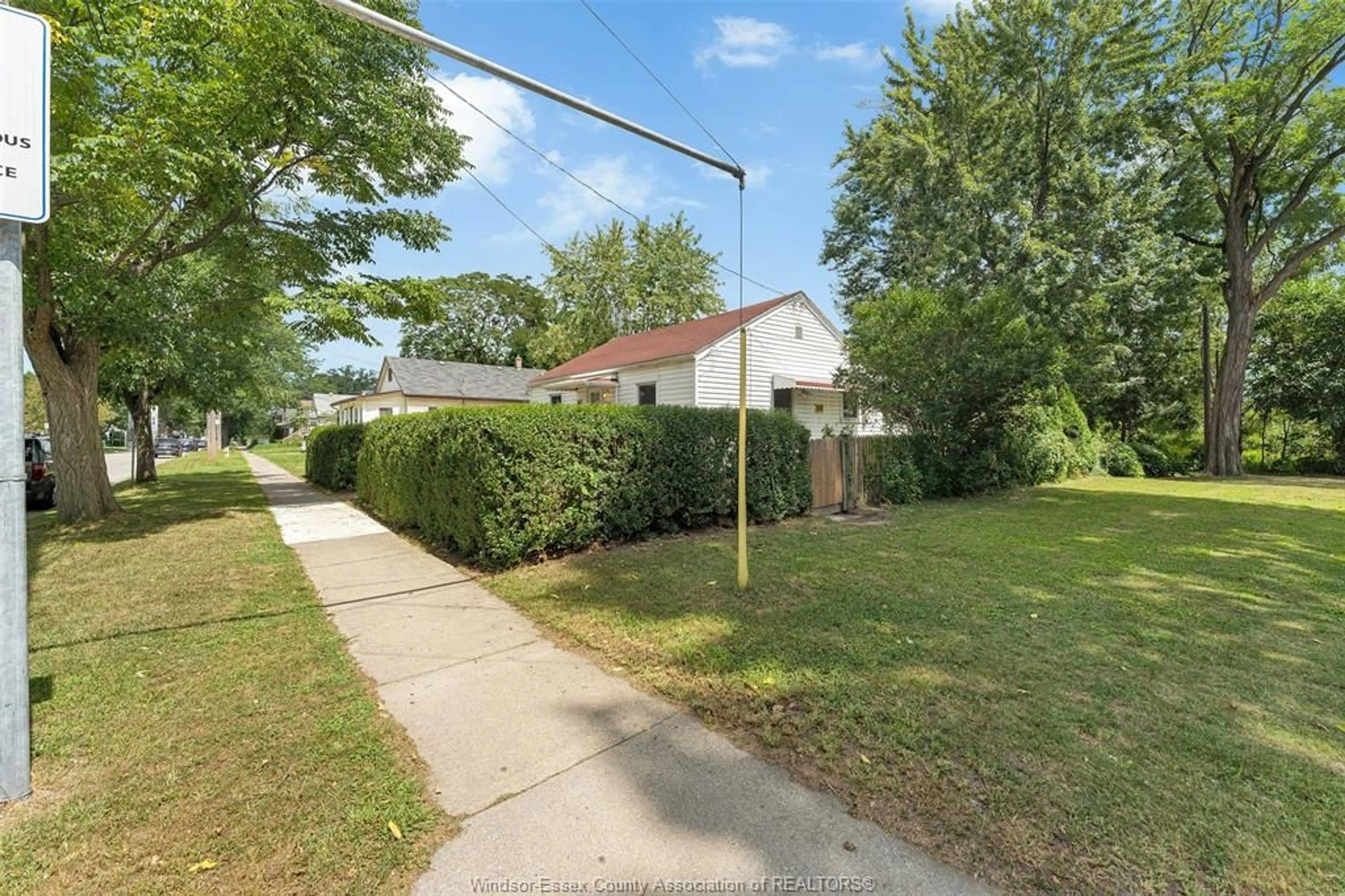 A pic from outside/outdoor area/front of a property/back of a property/a pic from drone, street for 3597 BLOOMFIELD, Windsor Ontario N9C 1V9