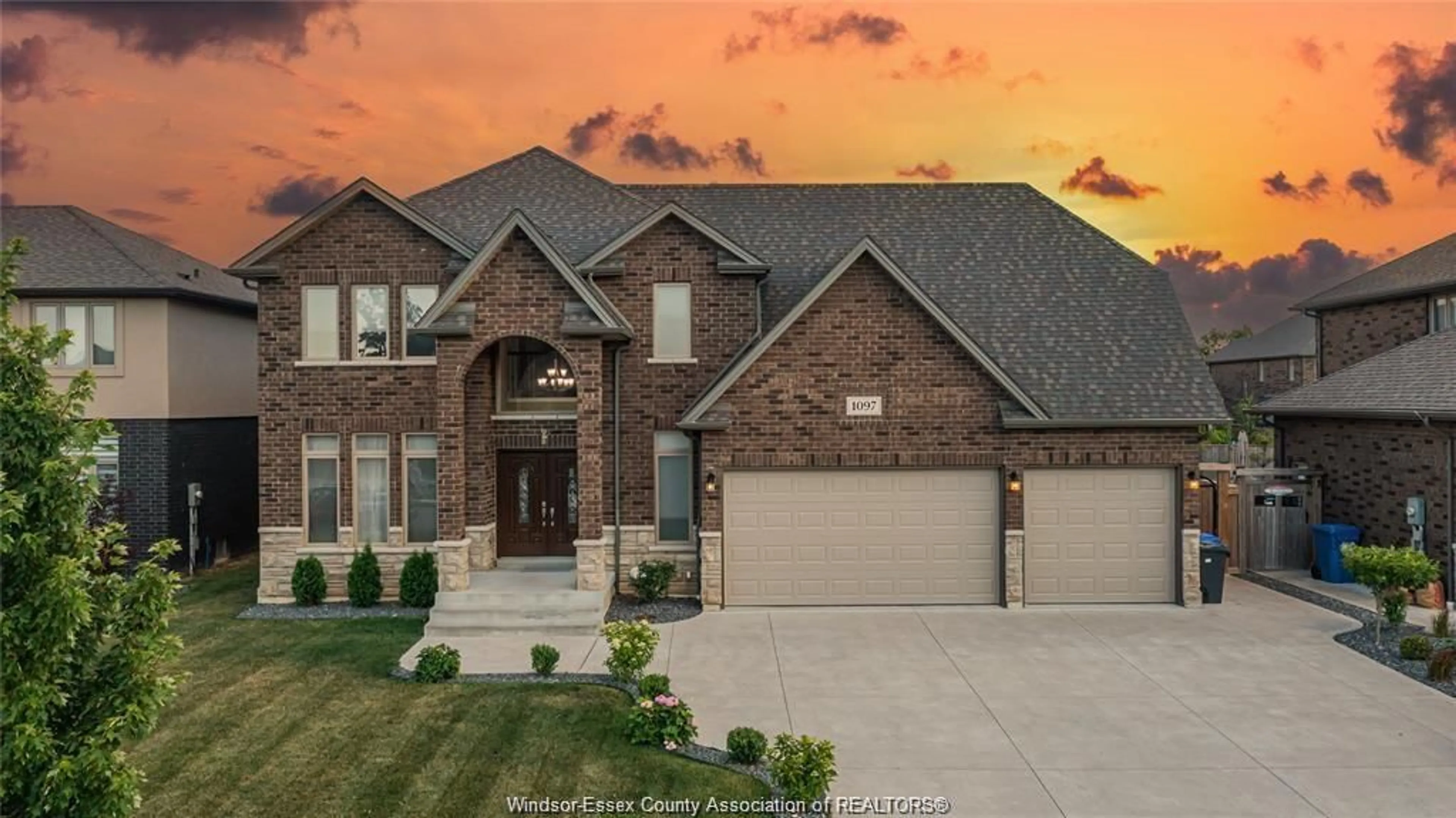 Home with brick exterior material, street for 1097 CHARLOTTE Cres, Lakeshore Ontario N0R 1A0