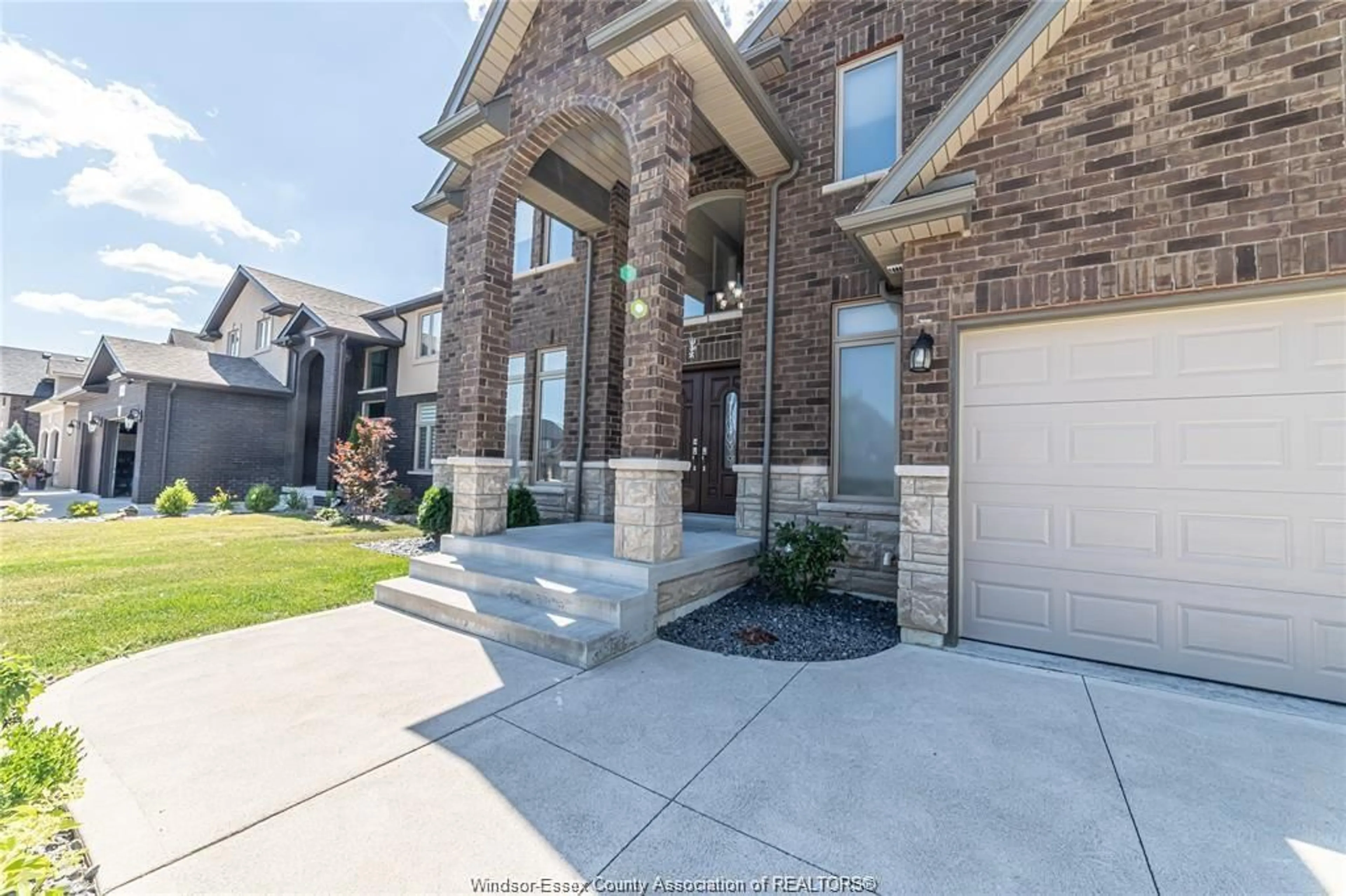 Home with brick exterior material, street for 1097 CHARLOTTE Cres, Lakeshore Ontario N0R 1A0