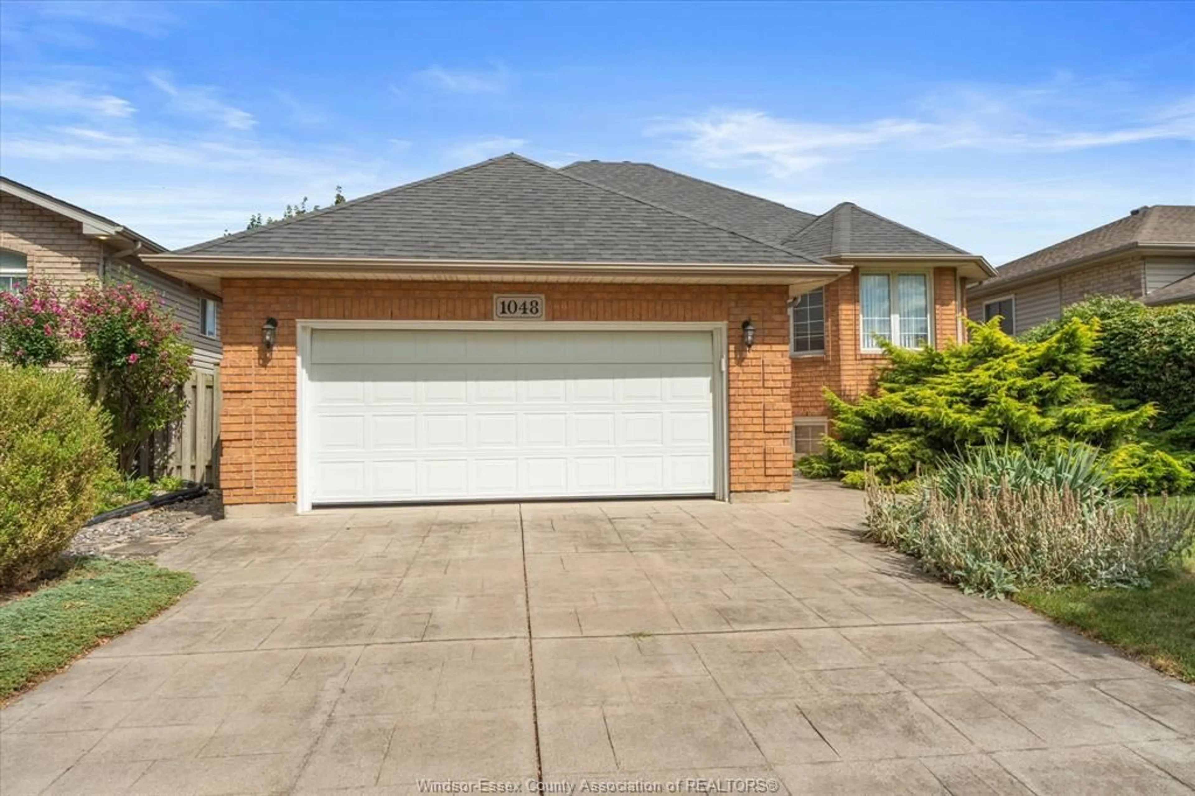 Home with brick exterior material, street for 1048 BELLAGIO, Windsor Ontario N8P 1J6