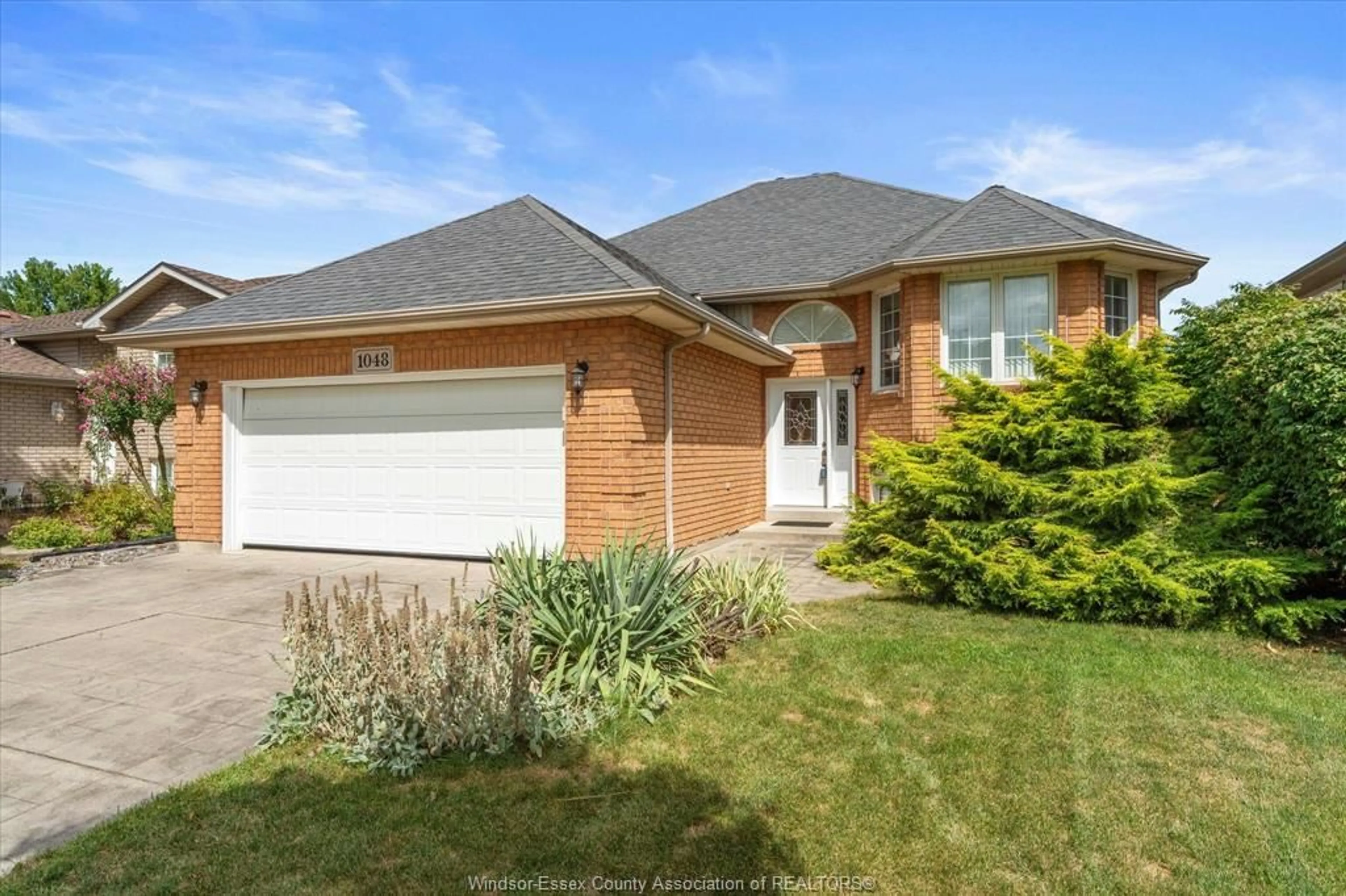 Home with brick exterior material, street for 1048 BELLAGIO, Windsor Ontario N8P 1J6