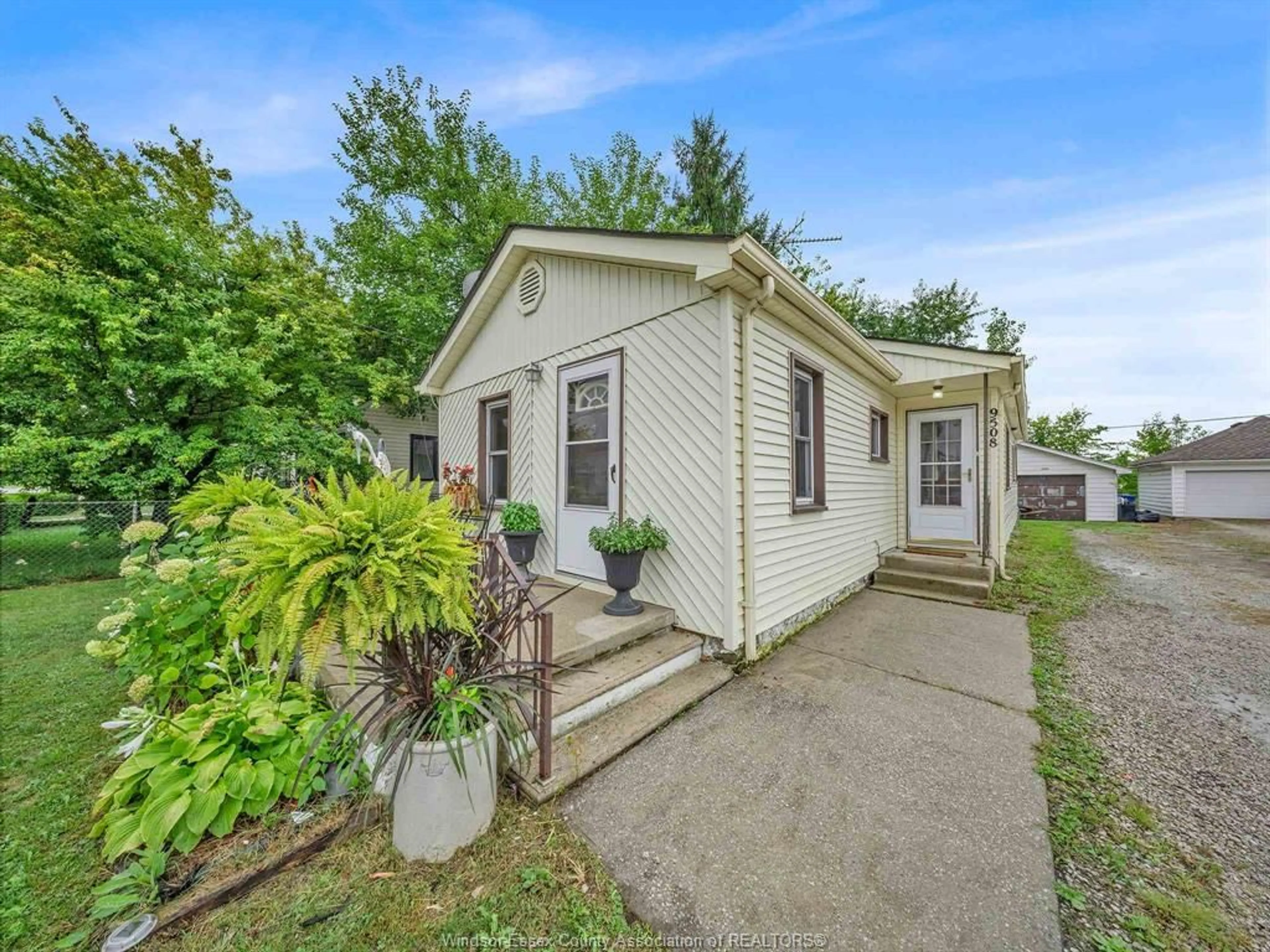 A pic from outside/outdoor area/front of a property/back of a property/a pic from drone, street for 9508 Walker, Amherstburg Ontario N0R 1J0