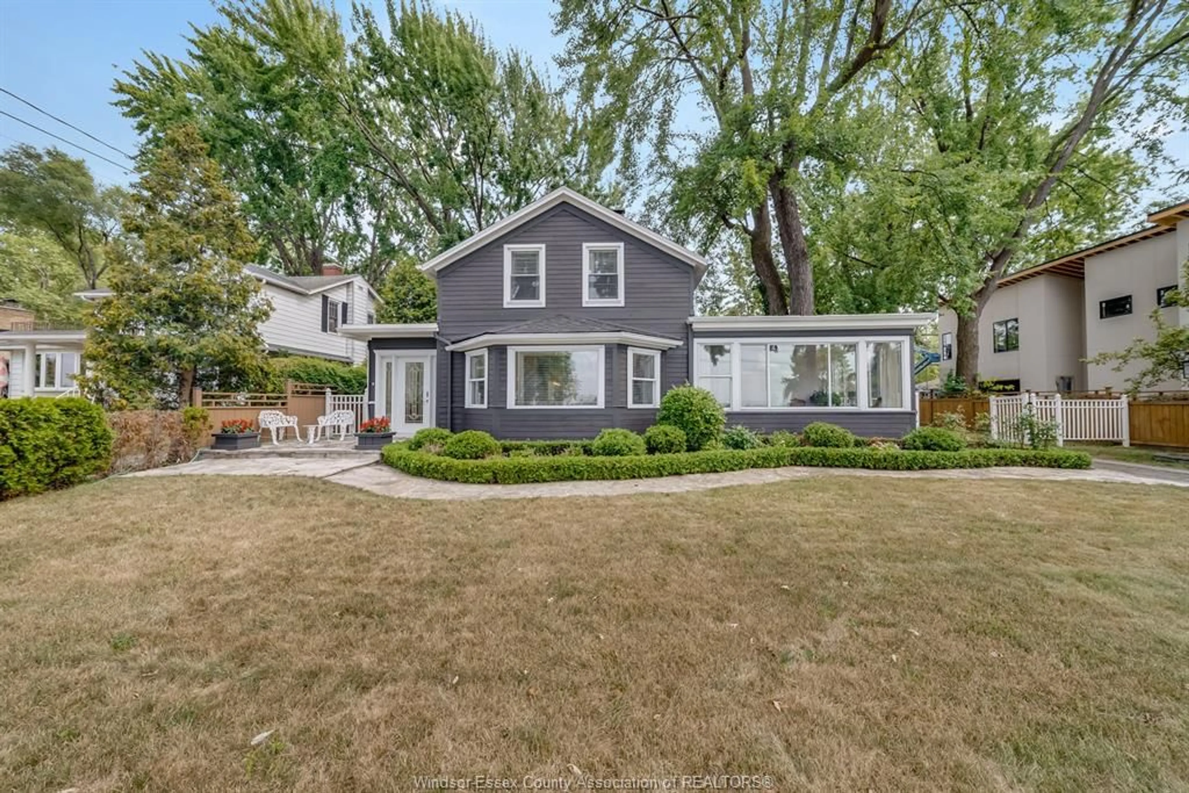 Home with vinyl exterior material, street for 4371 RIVERSIDE Dr, Windsor Ontario N8Y 1B7