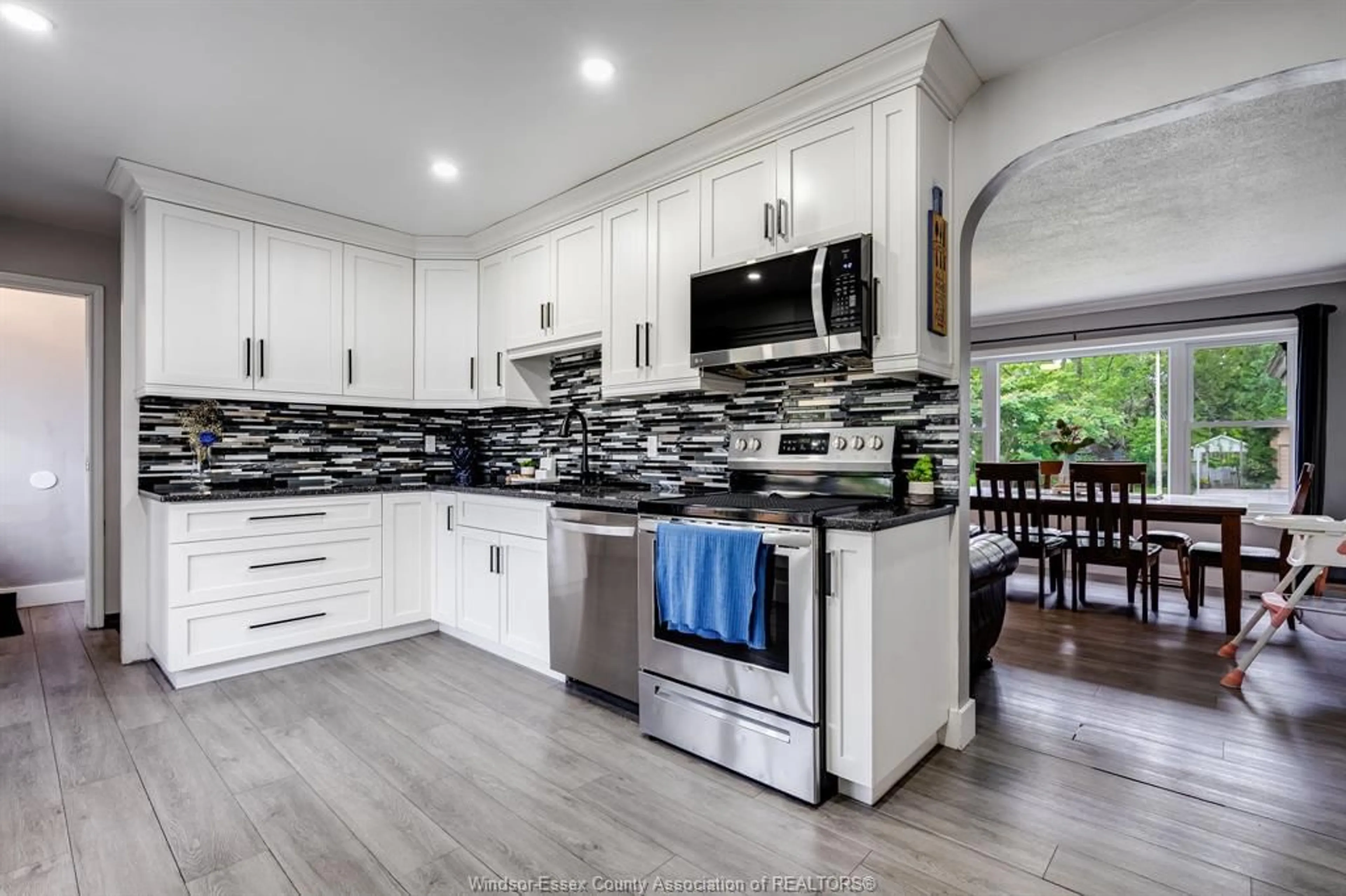 Open concept kitchen, ceramic/tile floor for 104 Danforth Ave, Leamington Ontario N8H 2R2