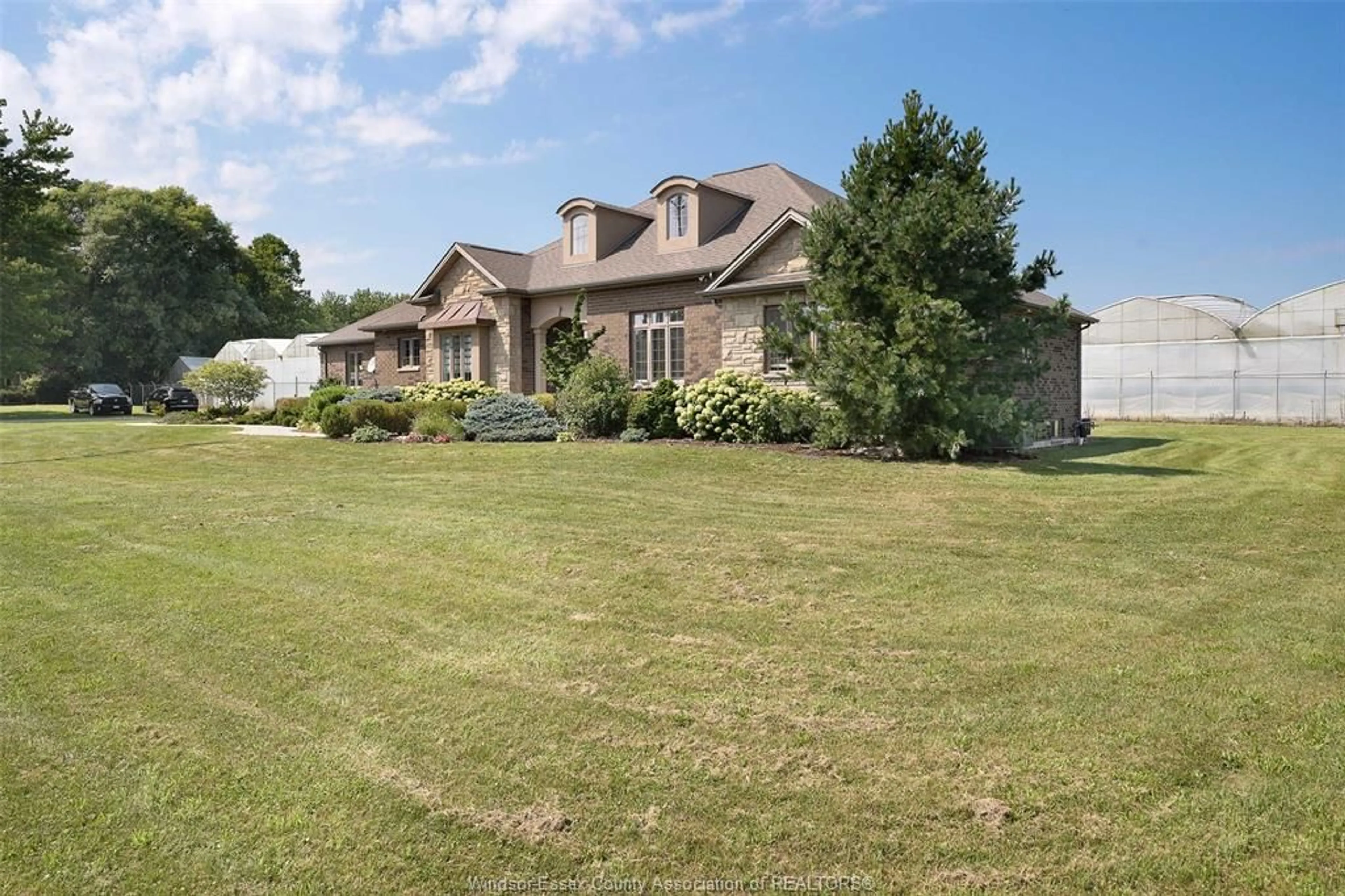 A pic from outside/outdoor area/front of a property/back of a property/a pic from drone, unknown for 1027 MERSEA ROAD 2, Leamington Ontario N8H 3V7