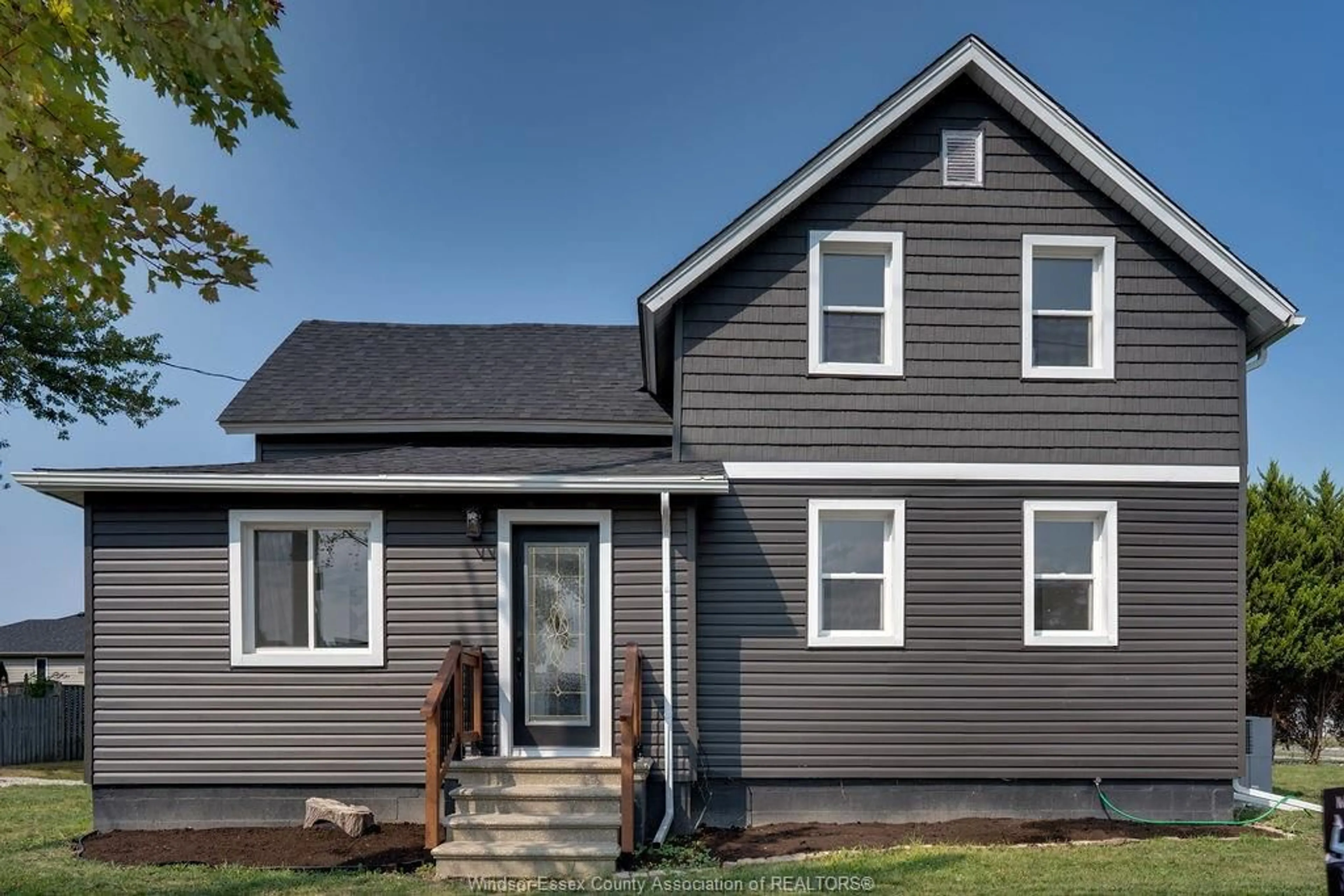 Home with vinyl exterior material, street for 13028 TECUMSEH Rd, Tecumseh Ontario N8N 3T6Q