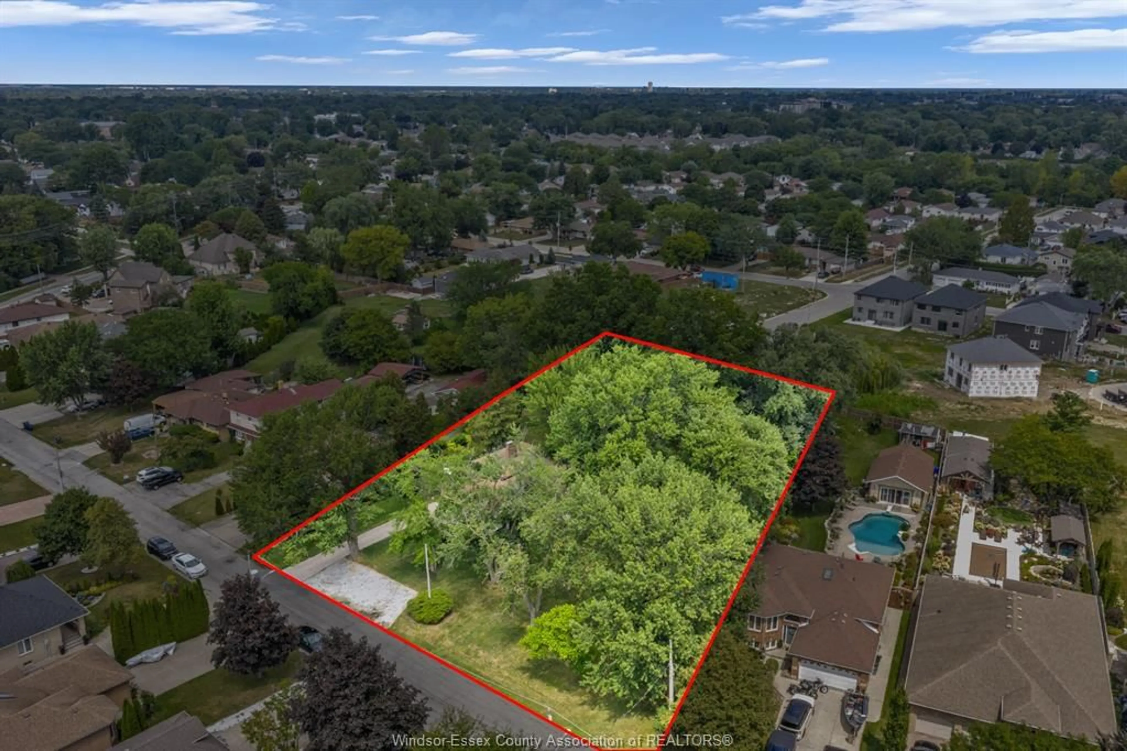A pic from outside/outdoor area/front of a property/back of a property/a pic from drone, water/lake/river/ocean view for 2702 TOURANGEAU, Windsor Ontario N8W 4P3