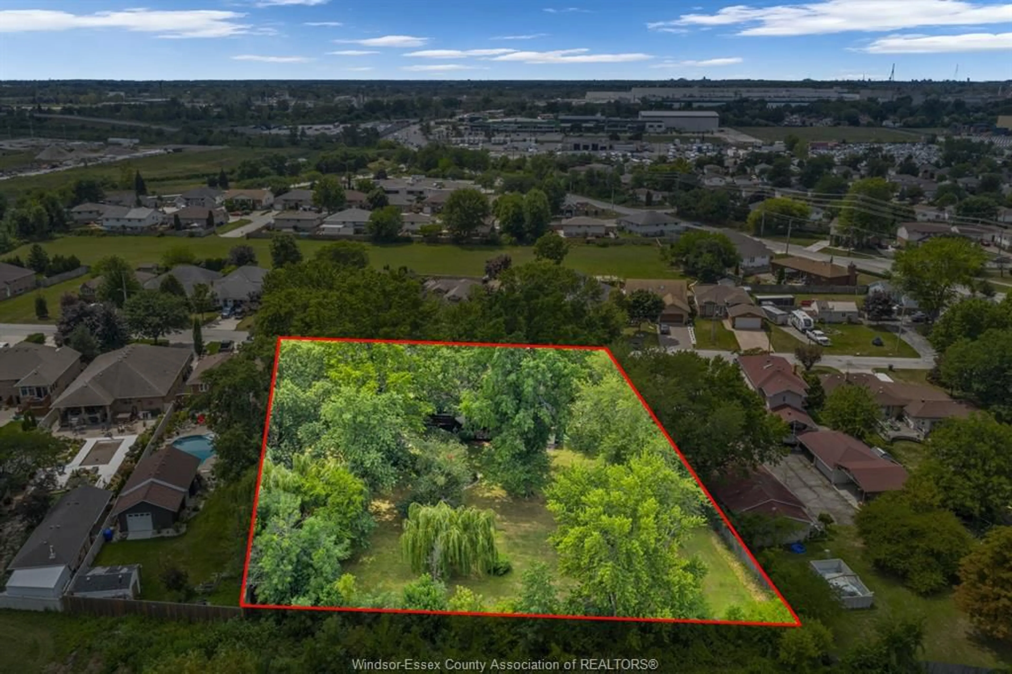 A pic from outside/outdoor area/front of a property/back of a property/a pic from drone, water/lake/river/ocean view for 2702 TOURANGEAU, Windsor Ontario N8W 4P3