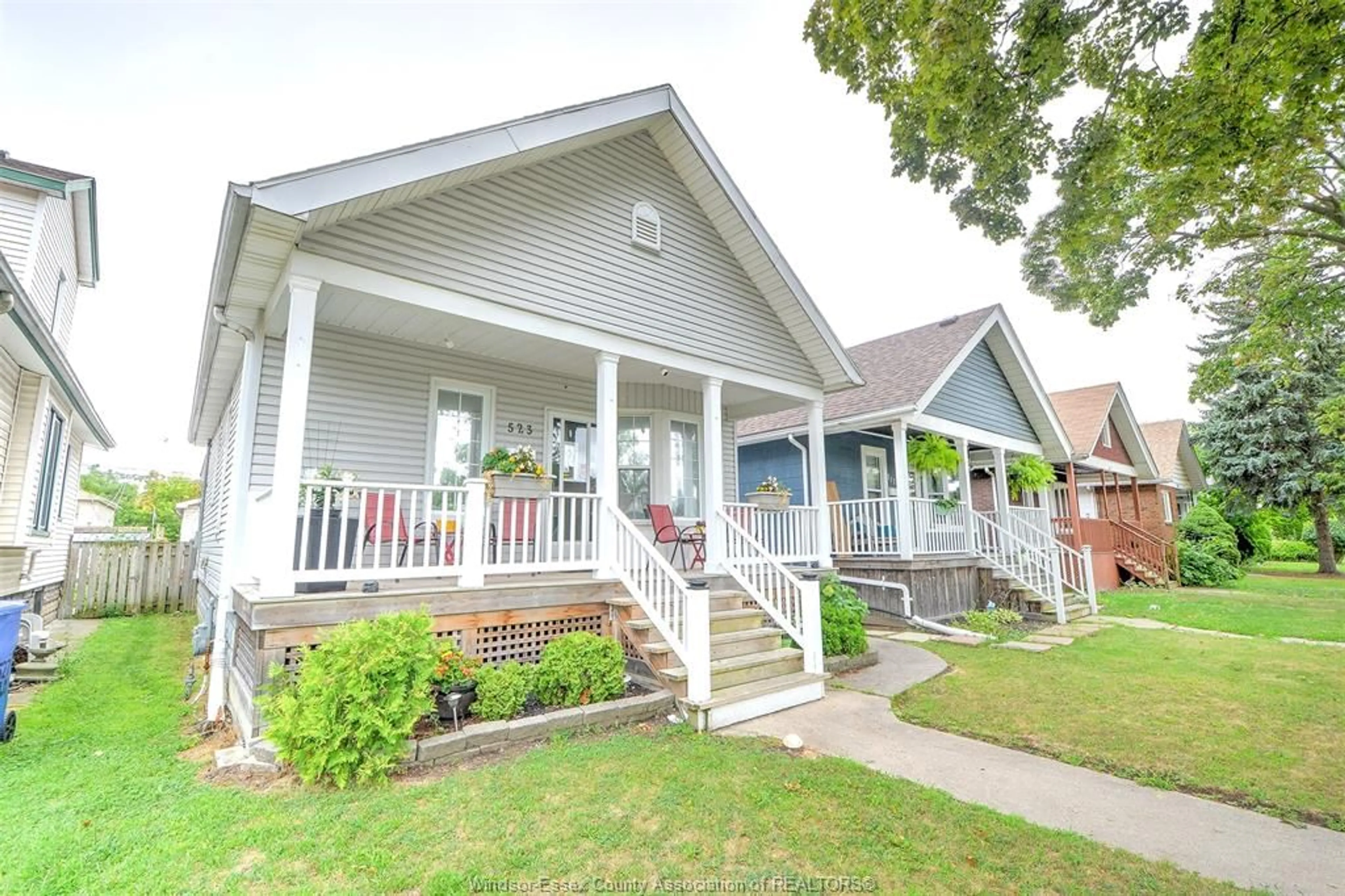 Home with vinyl exterior material, street for 523 ELM, Windsor Ontario N9A 5H2