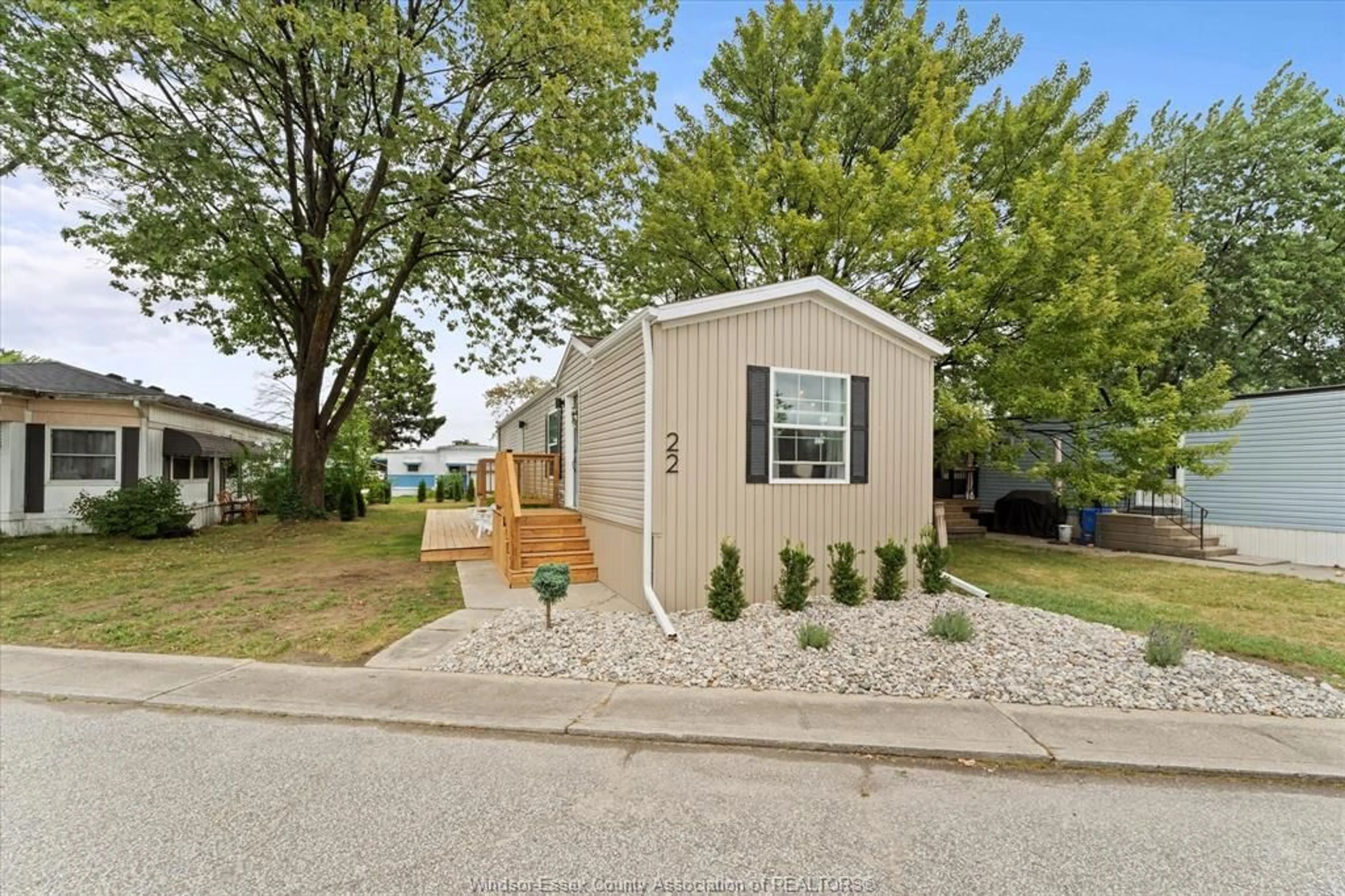Home with vinyl exterior material, street for 22 LAVINDALE, Lakeshore Ontario N8N 2T2