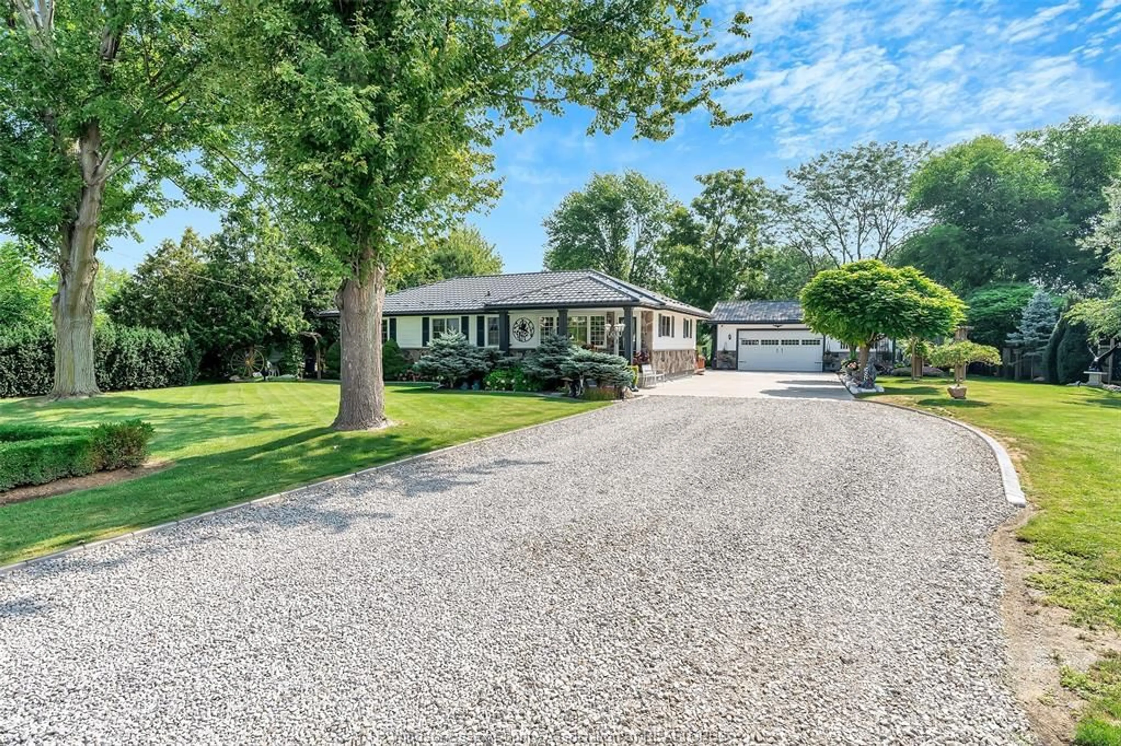 A pic from outside/outdoor area/front of a property/back of a property/a pic from drone, street for 384 COUNTY RD 31, Lakeshore Ontario N0R 1A0